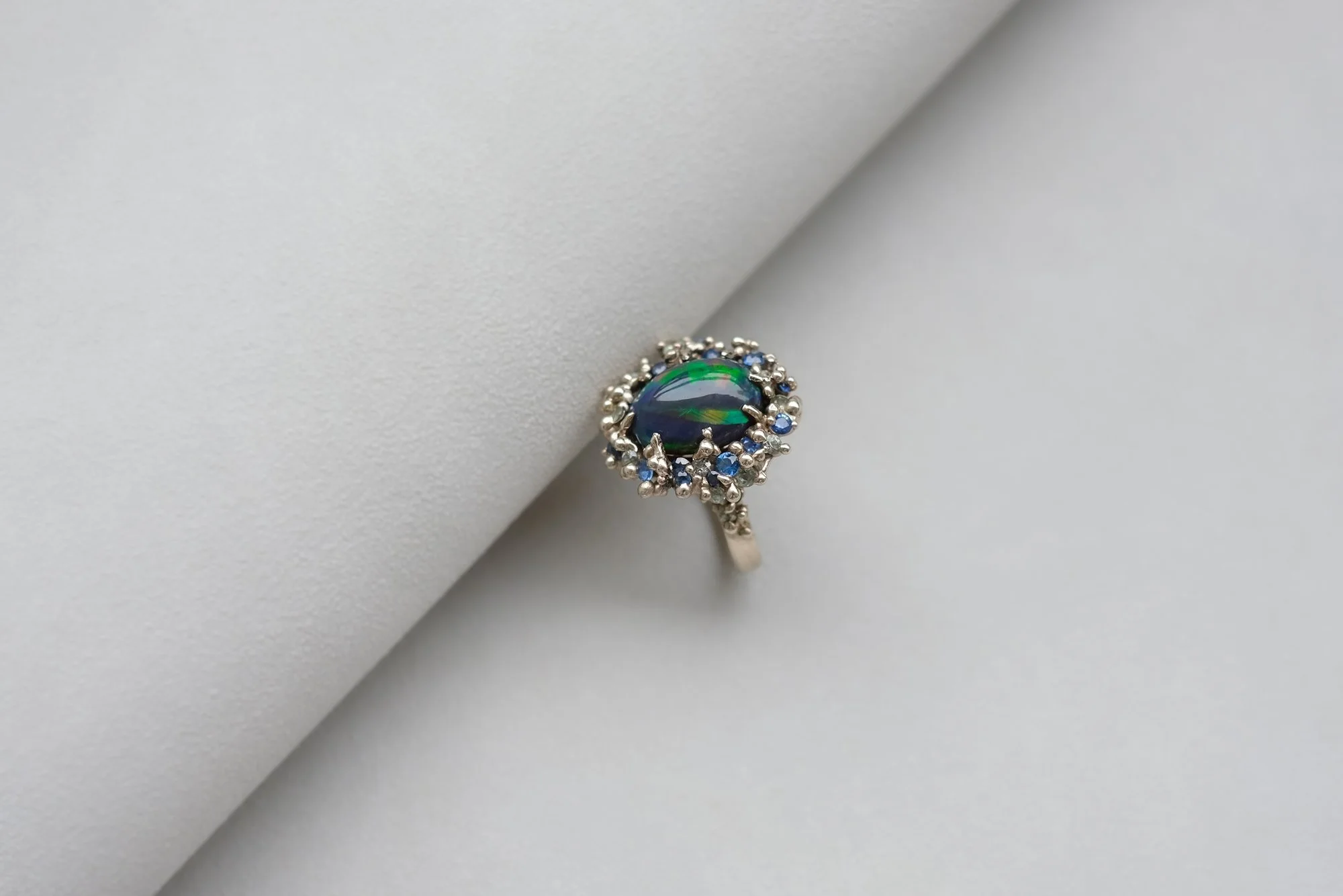 Black Opal Nebula Ring by Belinda Chang 04.jpg