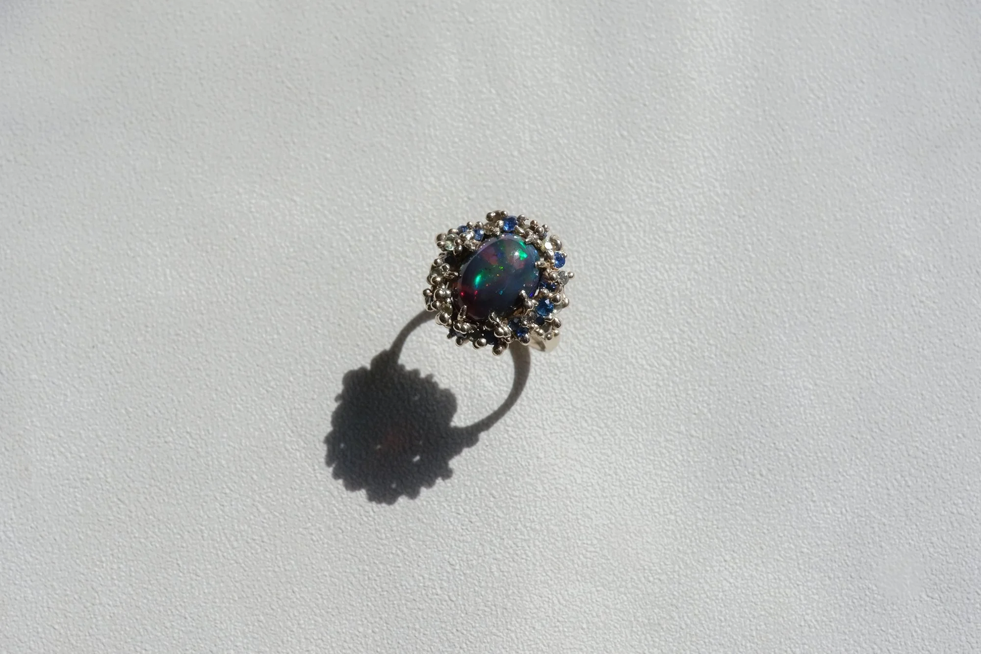 Black Opal Nebula Ring by Belinda Chang 08.jpg