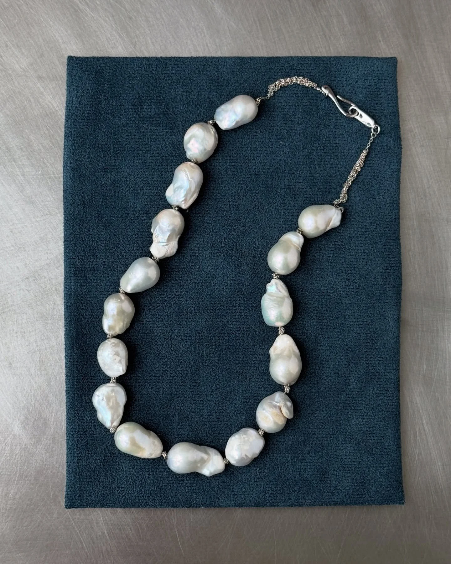 ⛓️Entwined Pearl Necklace ⛓️ ➰➰ This series draws inspiration from the discreet knot often found at the center of traditional pearl necklaces&mdash;a practical technique used to prevent pearls from scattering should the string break. 

Here, that str