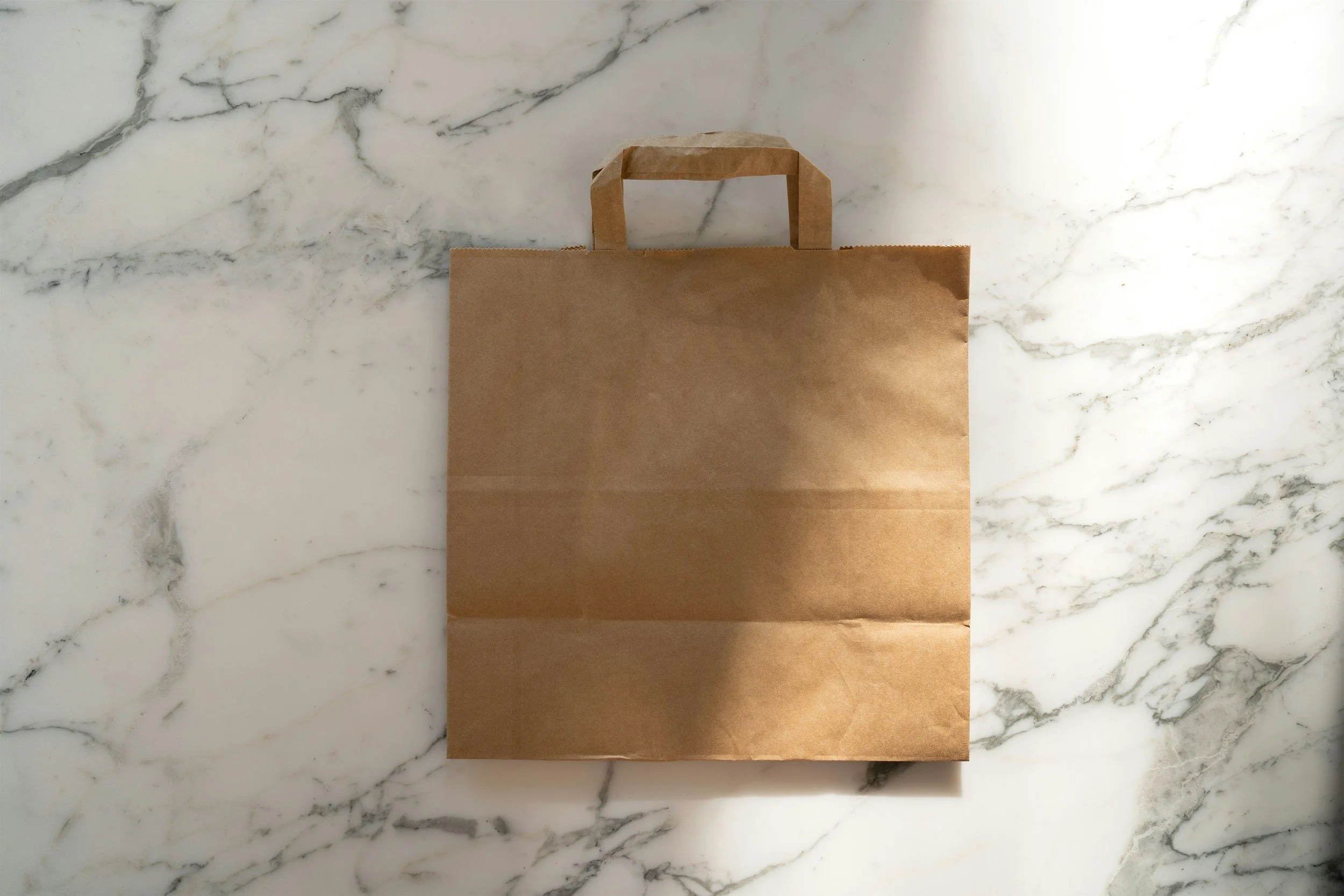 Paper grocery bags in good condition accepted for reuse