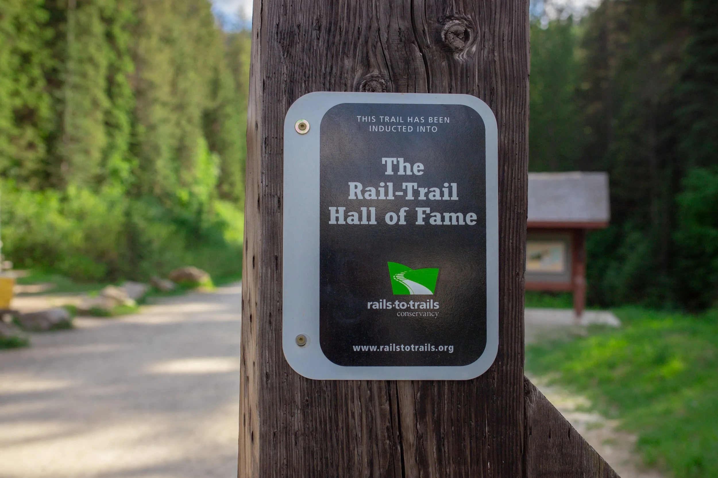 The rail-trail hall of fame sign located at the hiawatha trail
