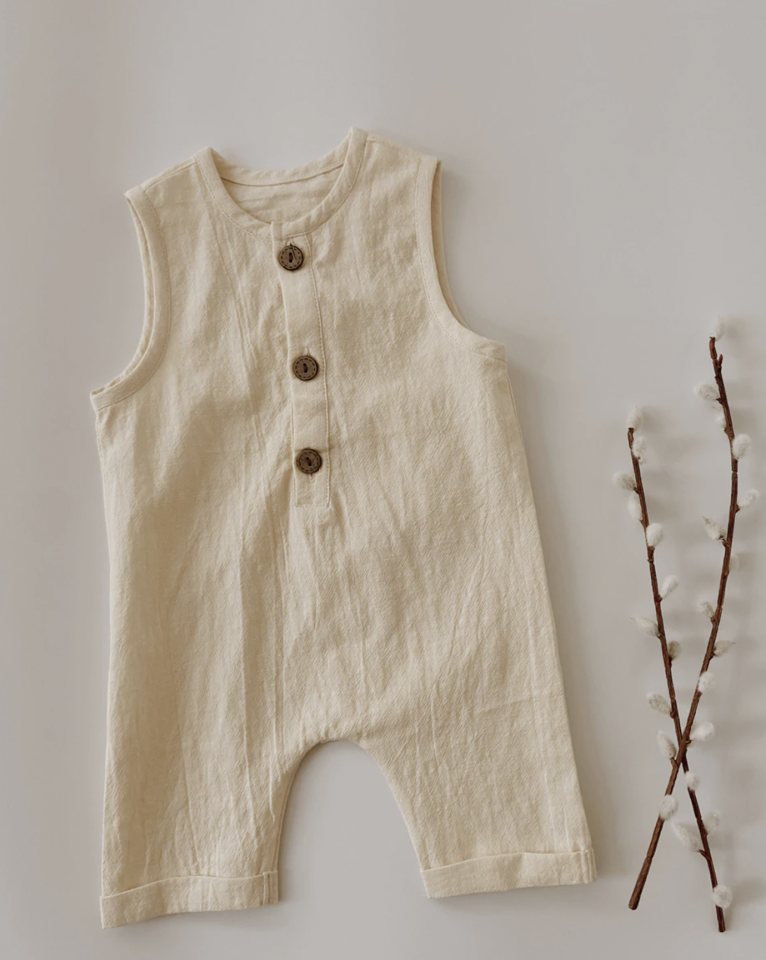 ROMPER IN BUTTERCREAM