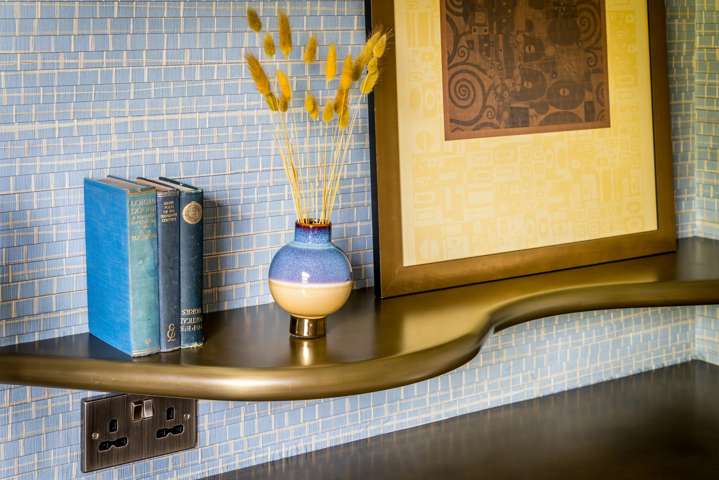 bespoke shelving with hand finished metallic spray finish