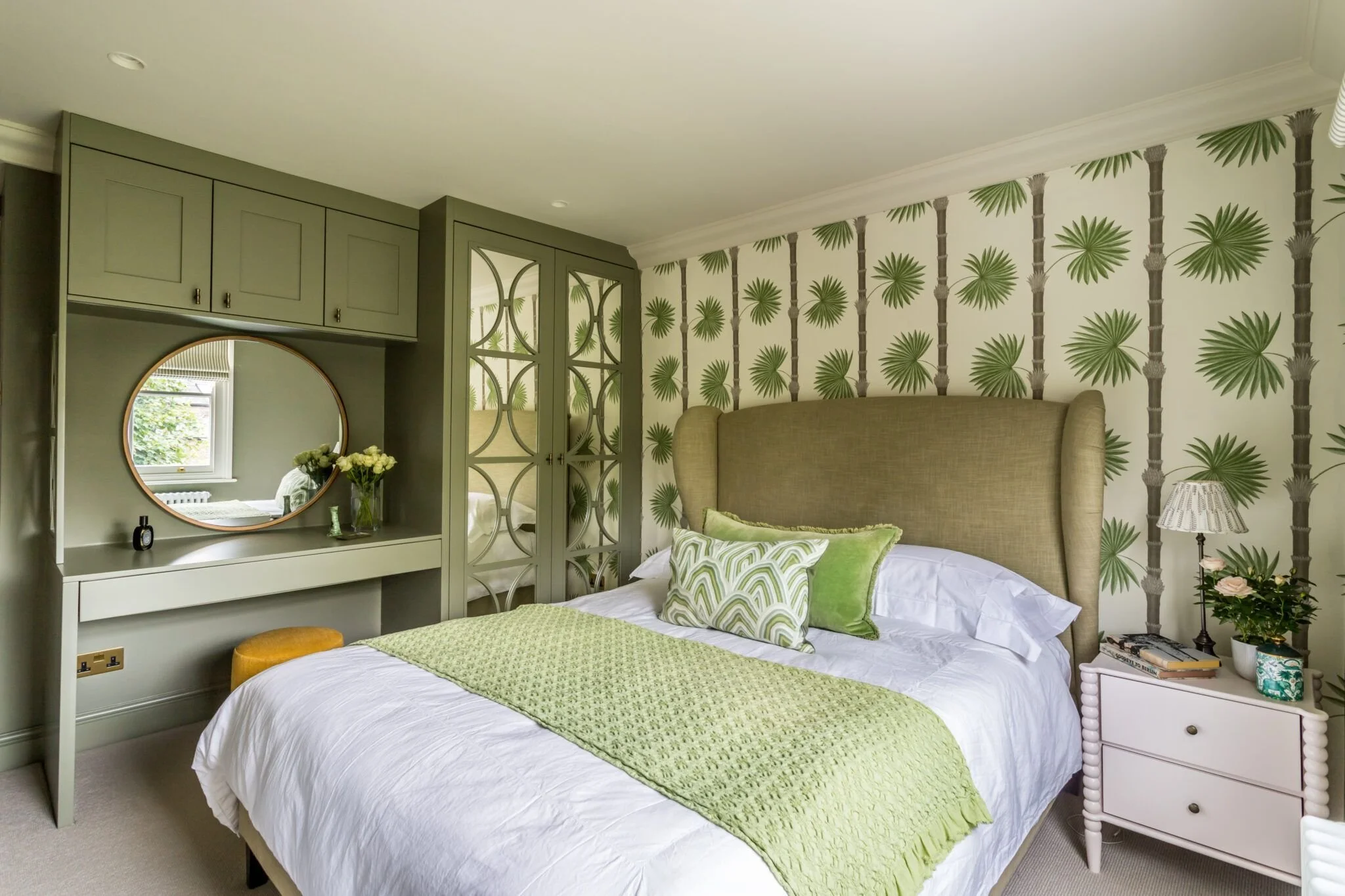 fitted bedroom furniture with decorative bespoke moulding and mirror inserts