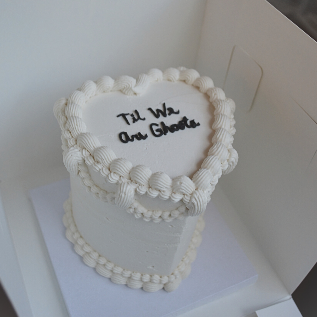 #121. This is a 4" heart-shaped, 3-layer vintage mini wedding cake.