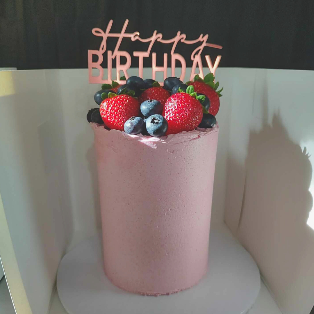 #85. This is a 4" round, 3-layer berry cake with fresh, organic strawberries and blueberries .