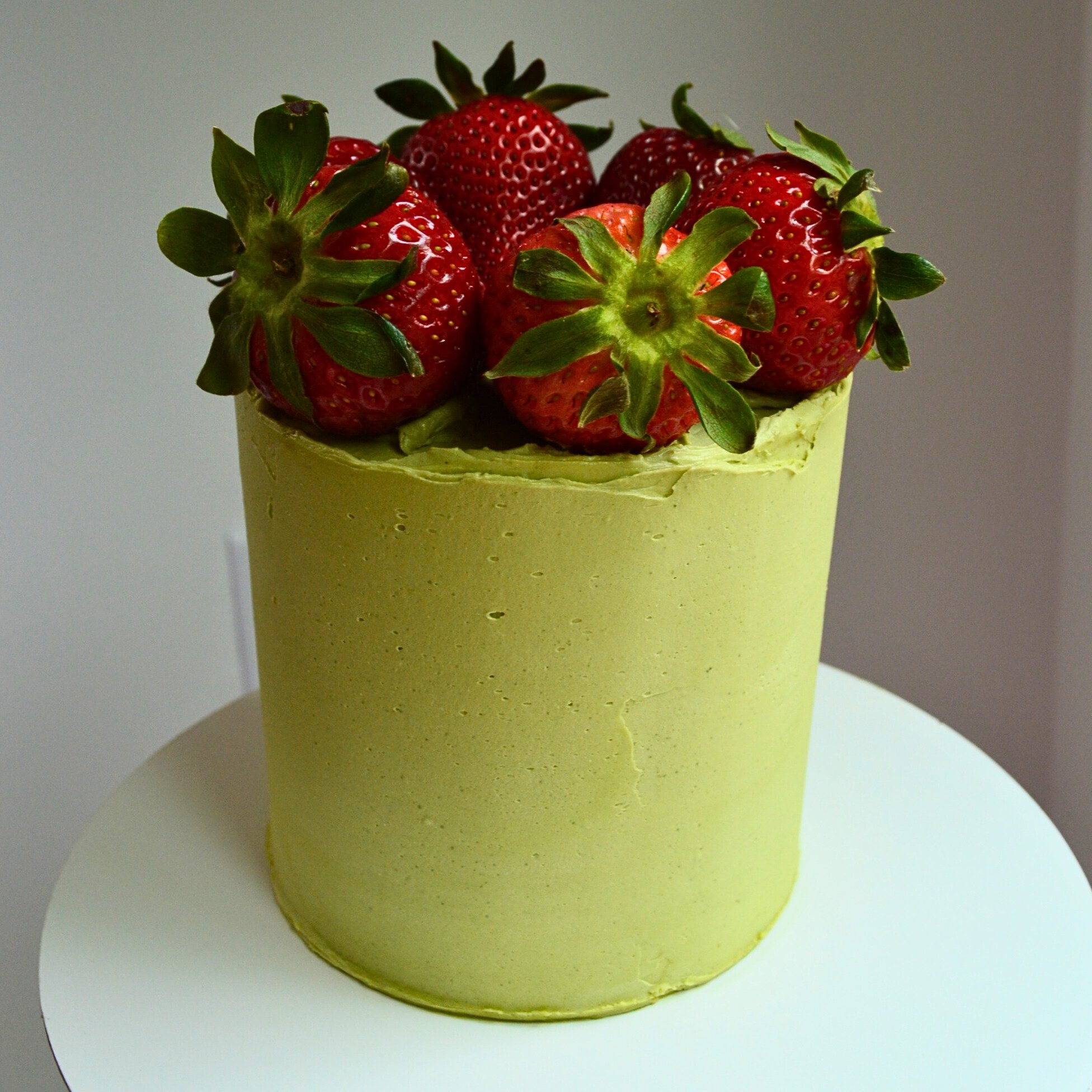 #27. Strawberry-matcha cake with fresh strawberries.