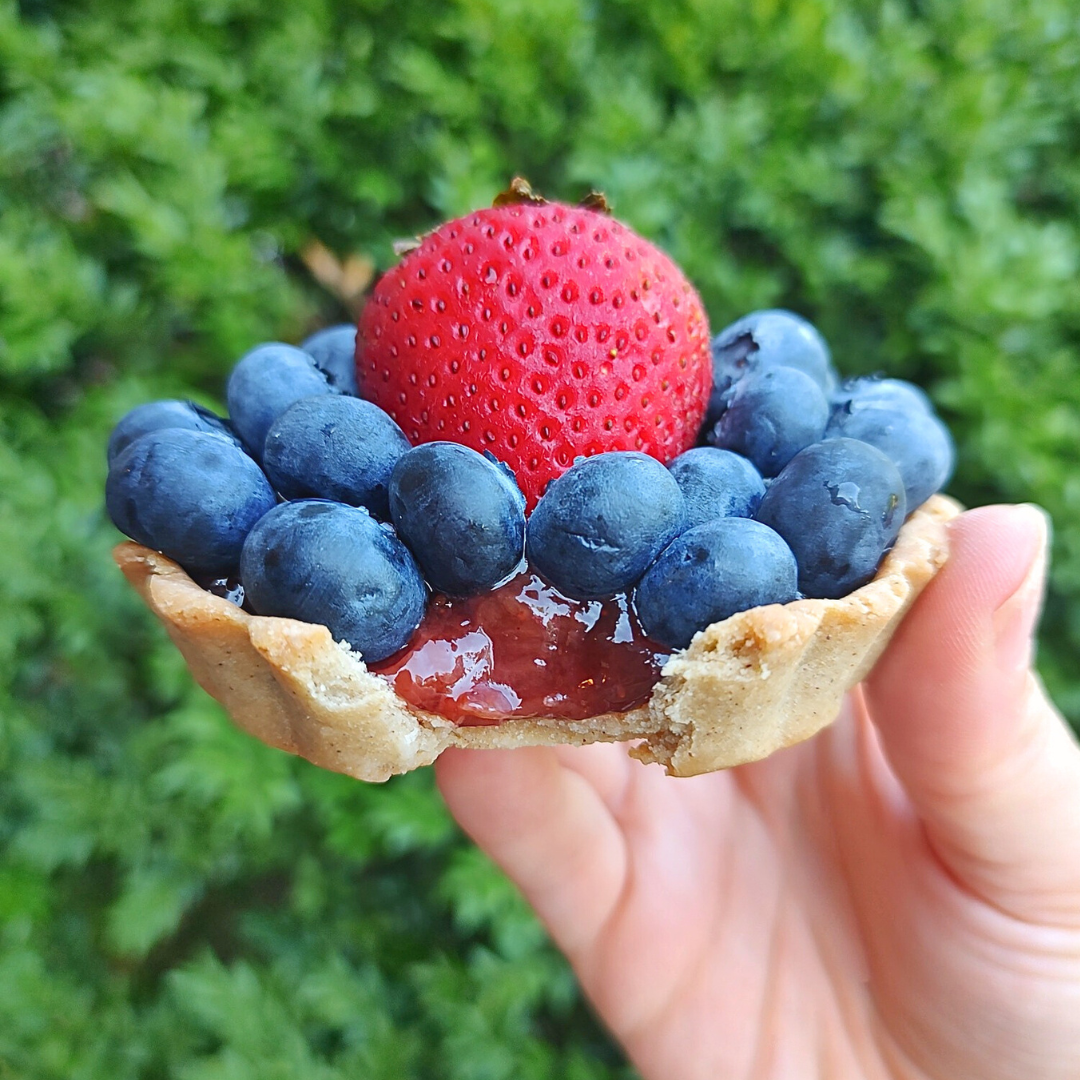 #15. This is a triple berry tart with a raspberry jam and fresh, organic blueberries and strawberry. Our tarts are available in our storefront and for special order if you email to request these.