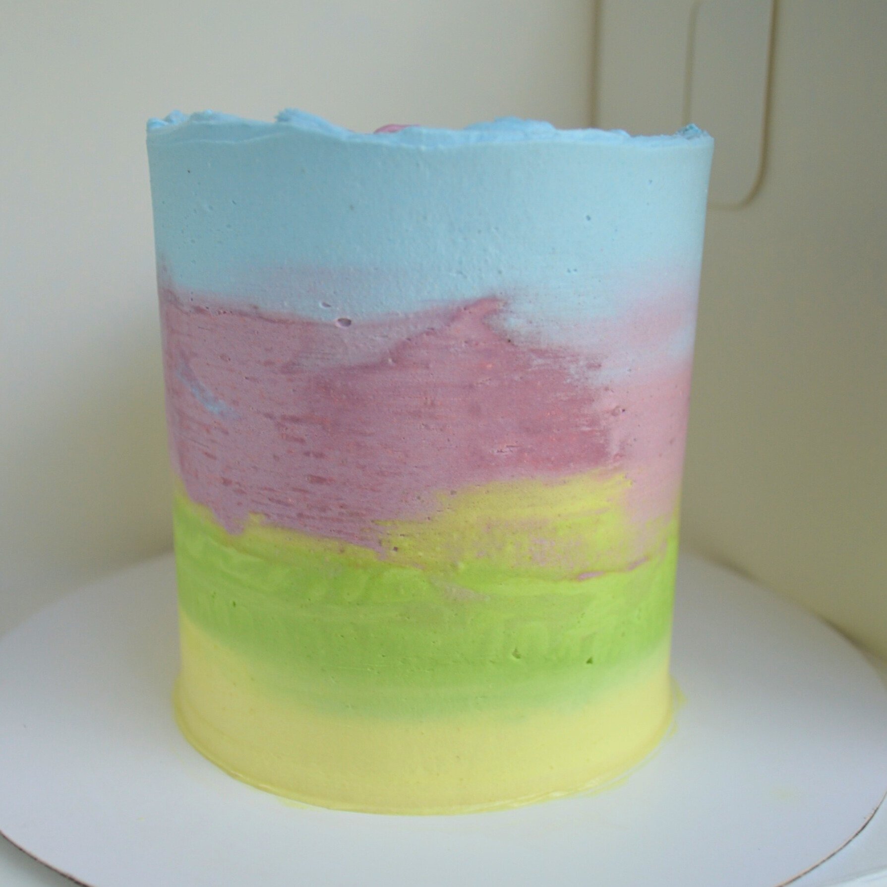 #66. Rainbow ombre cake with a natural top ridge.