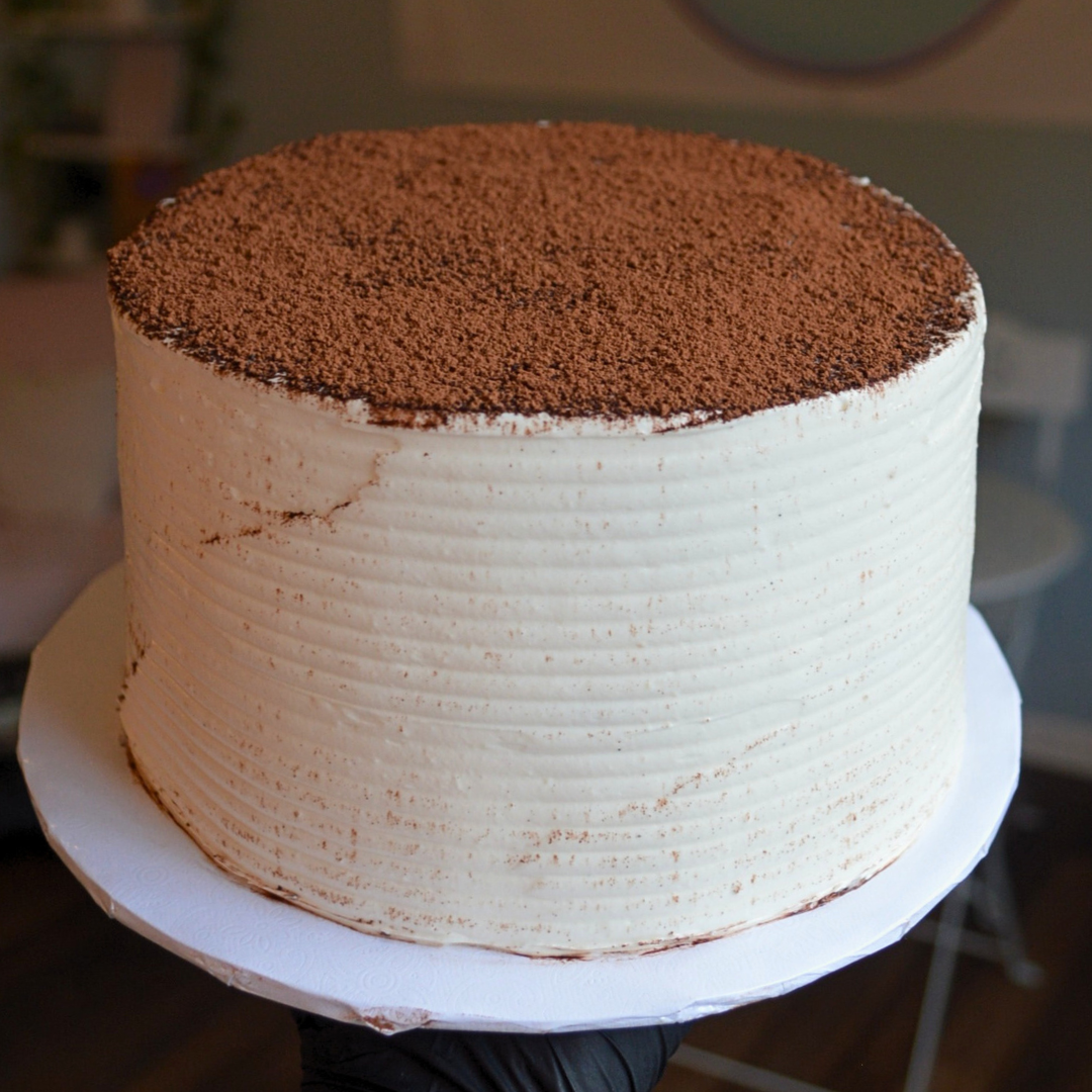 #118. This is an 8" round, 3-layer tiramisu cake.