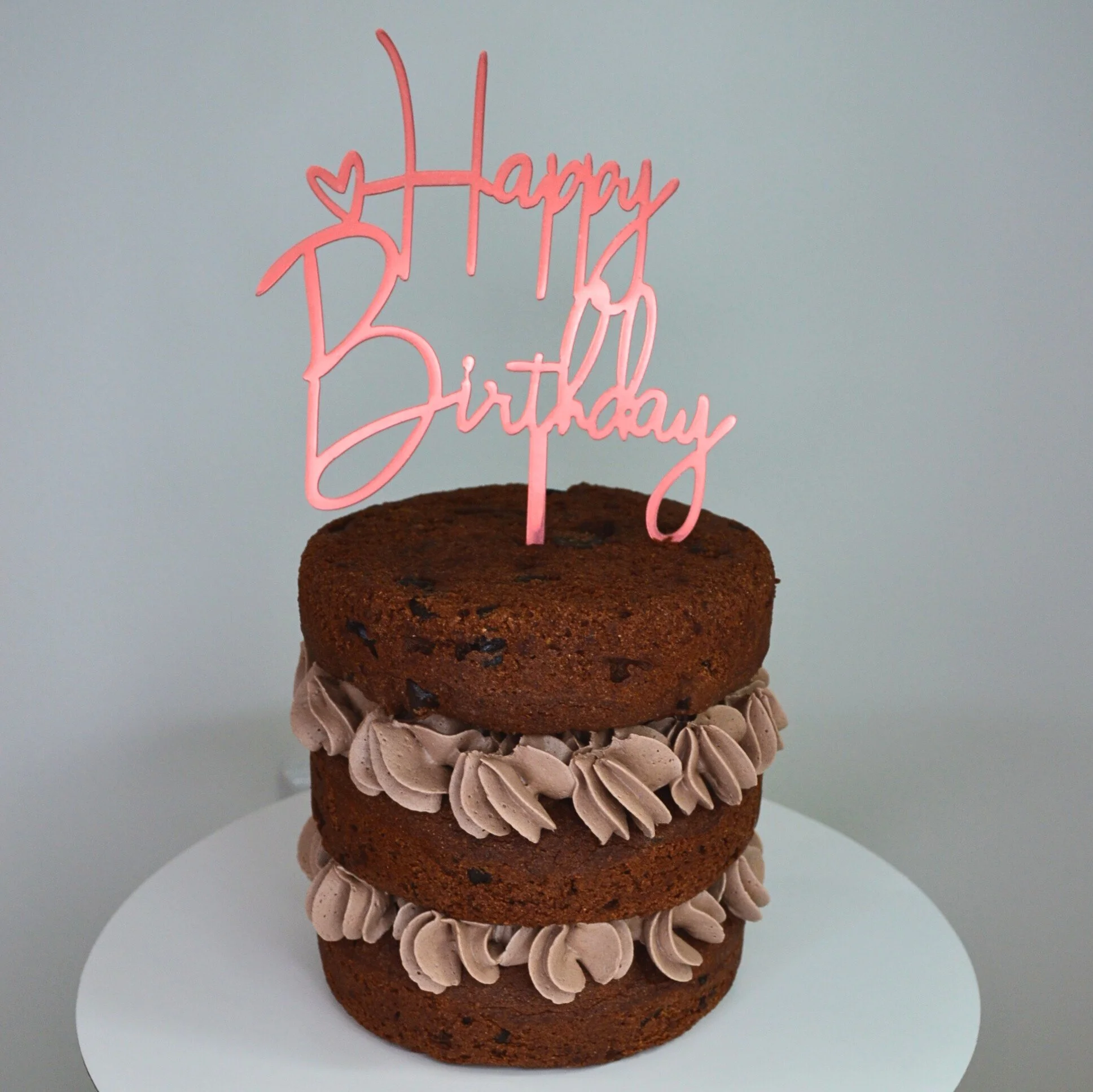 #11. This is a 4" round, 3-layer brownie with chocolate frosting in between.