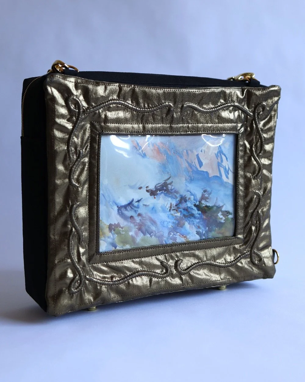 🖼️ Frame Purse 🖼️ A recent commission, sustainably made with deadstock materials. The client wanted an ornate frame with a window that would allow for interchangeable artwork. I got to try a new technique for this one - corded quilting. Definitely 
