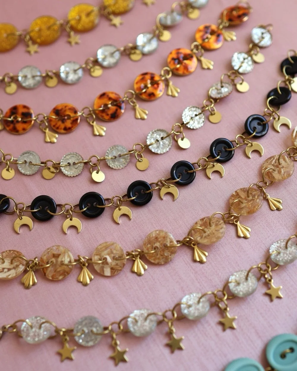 Starry Eyed Disco Button Charm Bracelets! I spent a lot of time finding the perfect vintage buttons for these. Each one is paired with different brass charms that flash and sparkle in the light. Limited edition, go forth and boogie over to my corner 