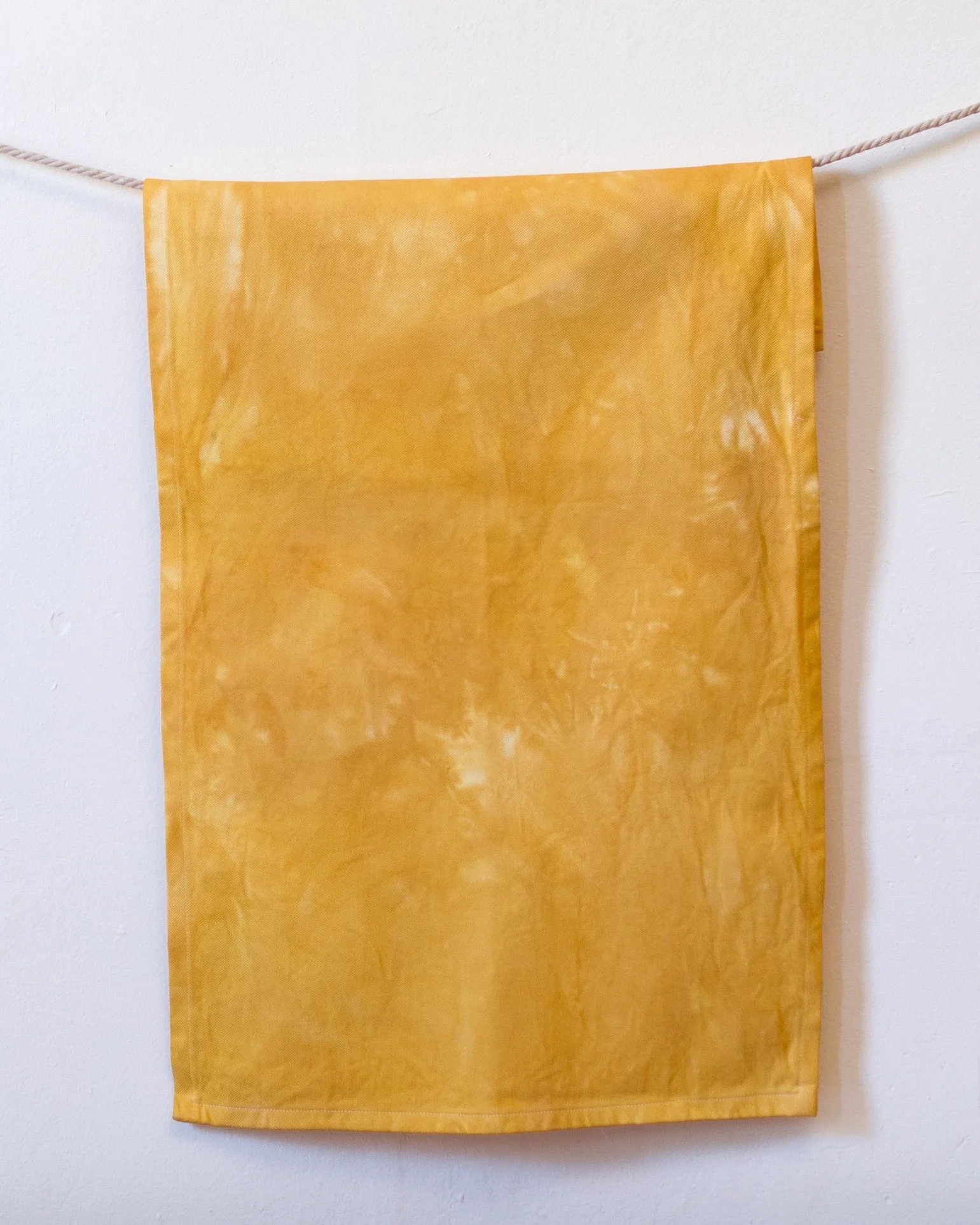 Onion skin dyed organic cotton tea towel