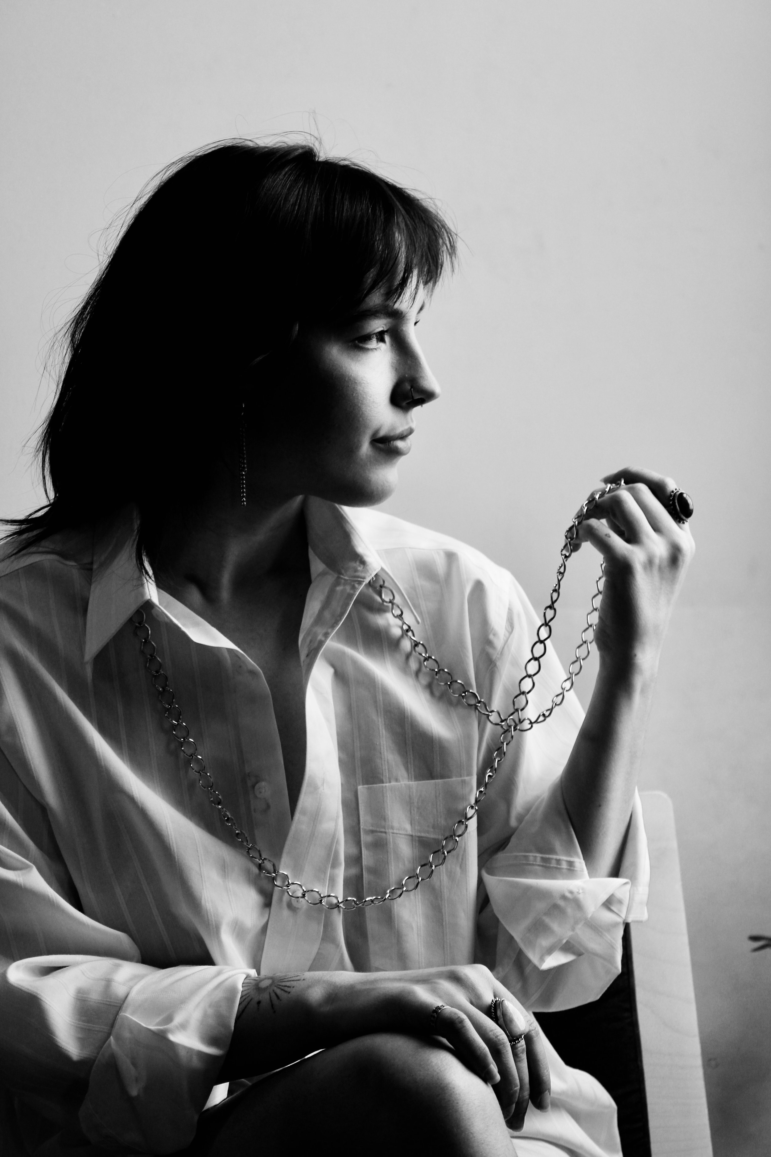 White shirt and necklace