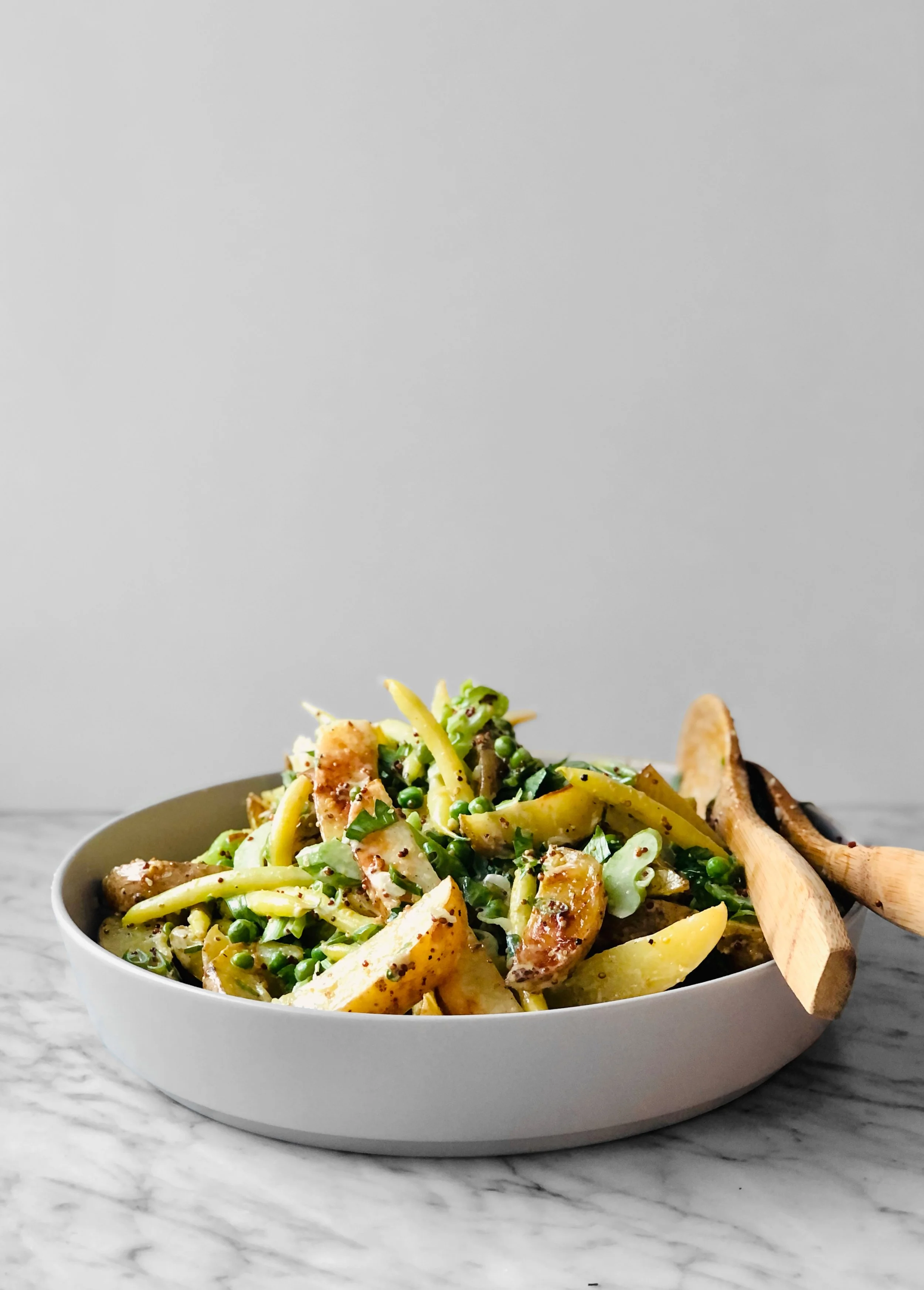 Salade de pommes de terre rôties et haricots jaunes