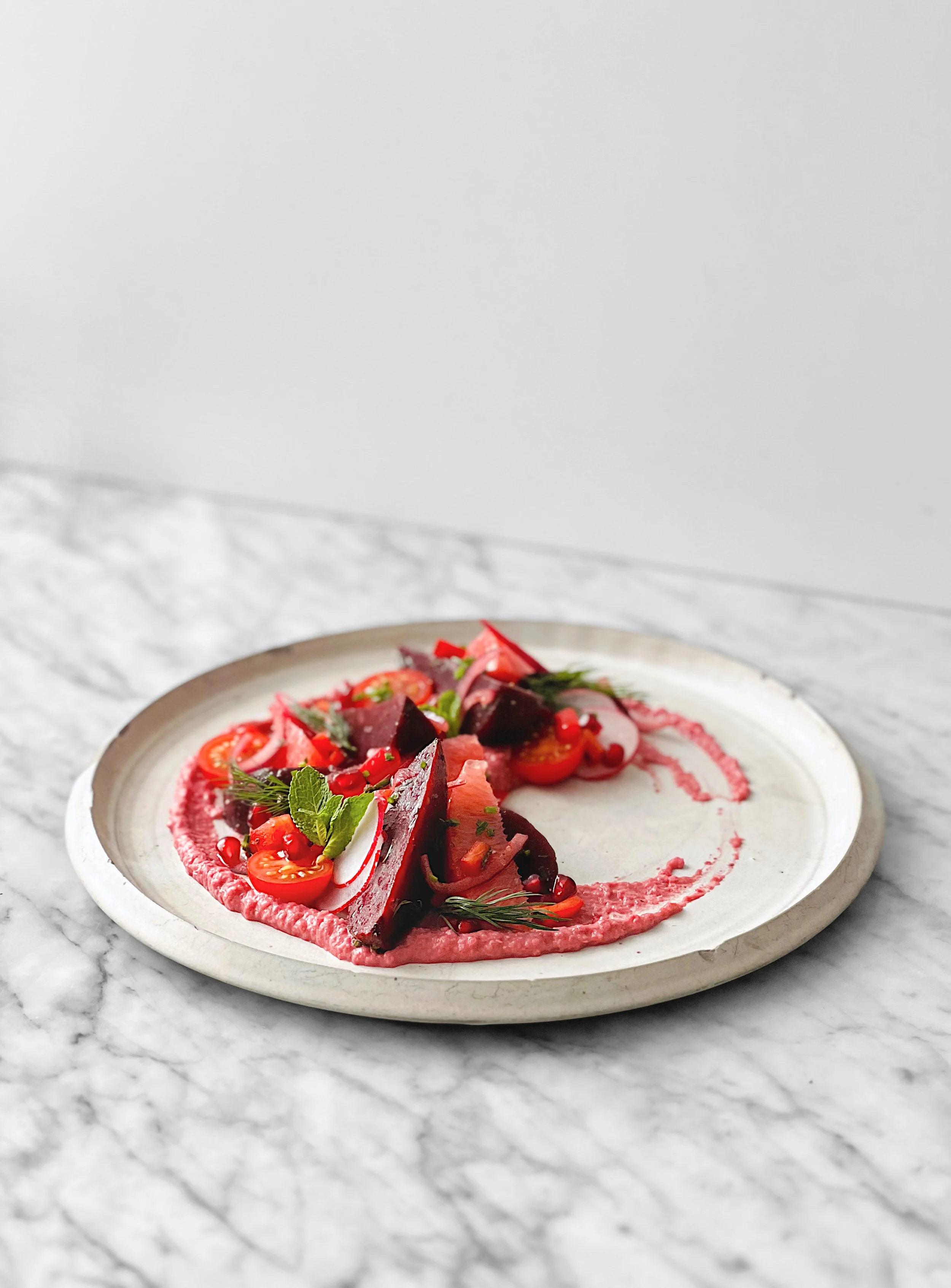 Salade rouge de betteraves, pamplemousse et pomme grenade