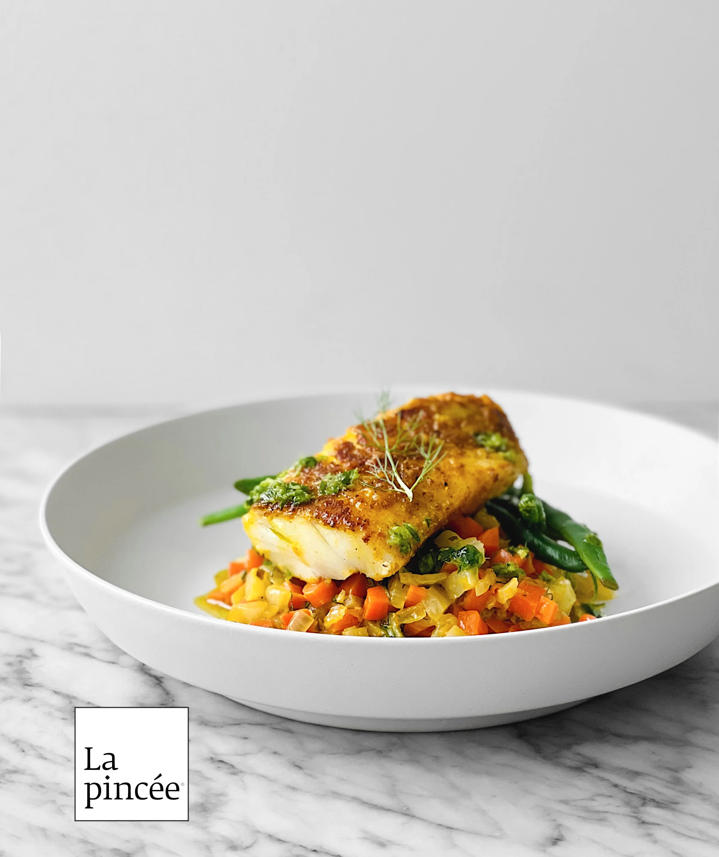 Morue Bombay, confit de fenouil et de carottes à l'orange