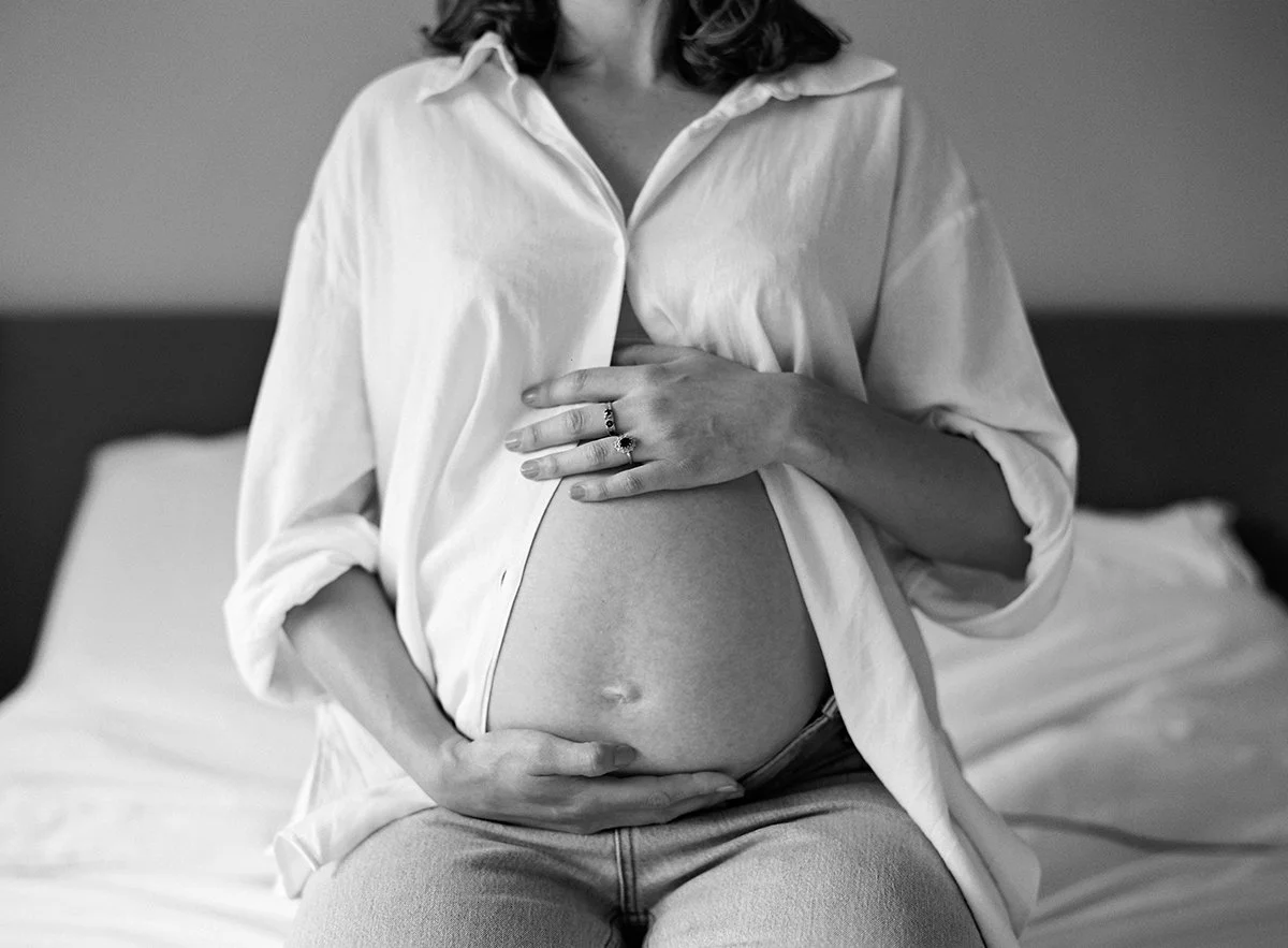 Close up maternity portrait of a Mum-to-be captured on black and white film.