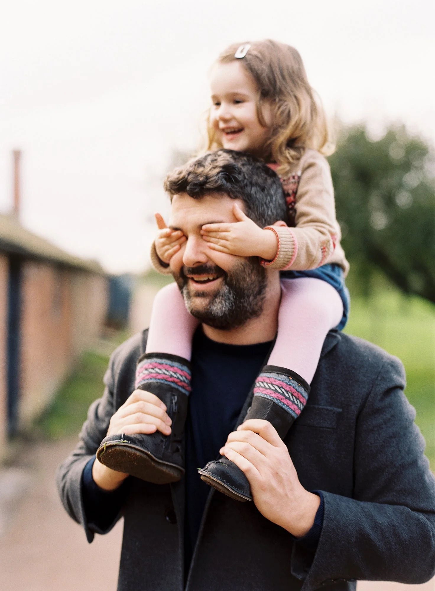 Portrait of a father and his little girl captured on film by family photographer Victoria Phipps
