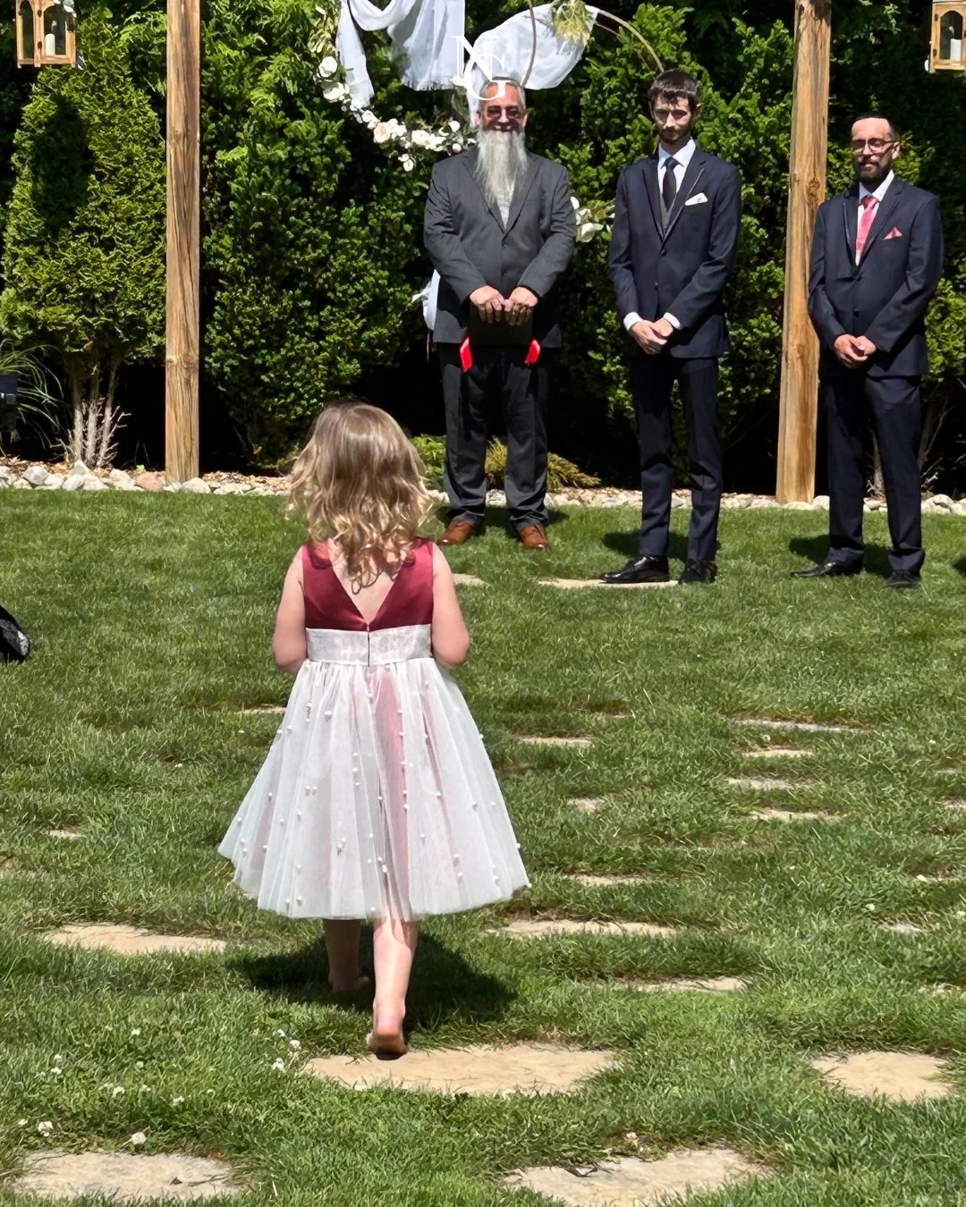 Our ceremony arch stands quiet now, trimmed with a touch of frost instead of flowers. In the stillness of this off-season, we find ourselves dreaming of the next couples who will walk down the aisle beneath those wooden beams. Though the garden slumb