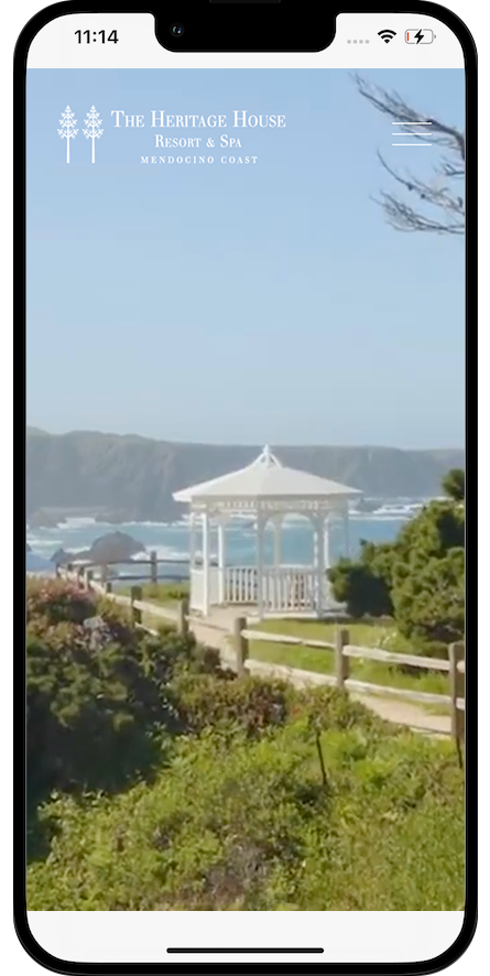 Screenshot of the Heritage House Resort & Spa website on a smartphone