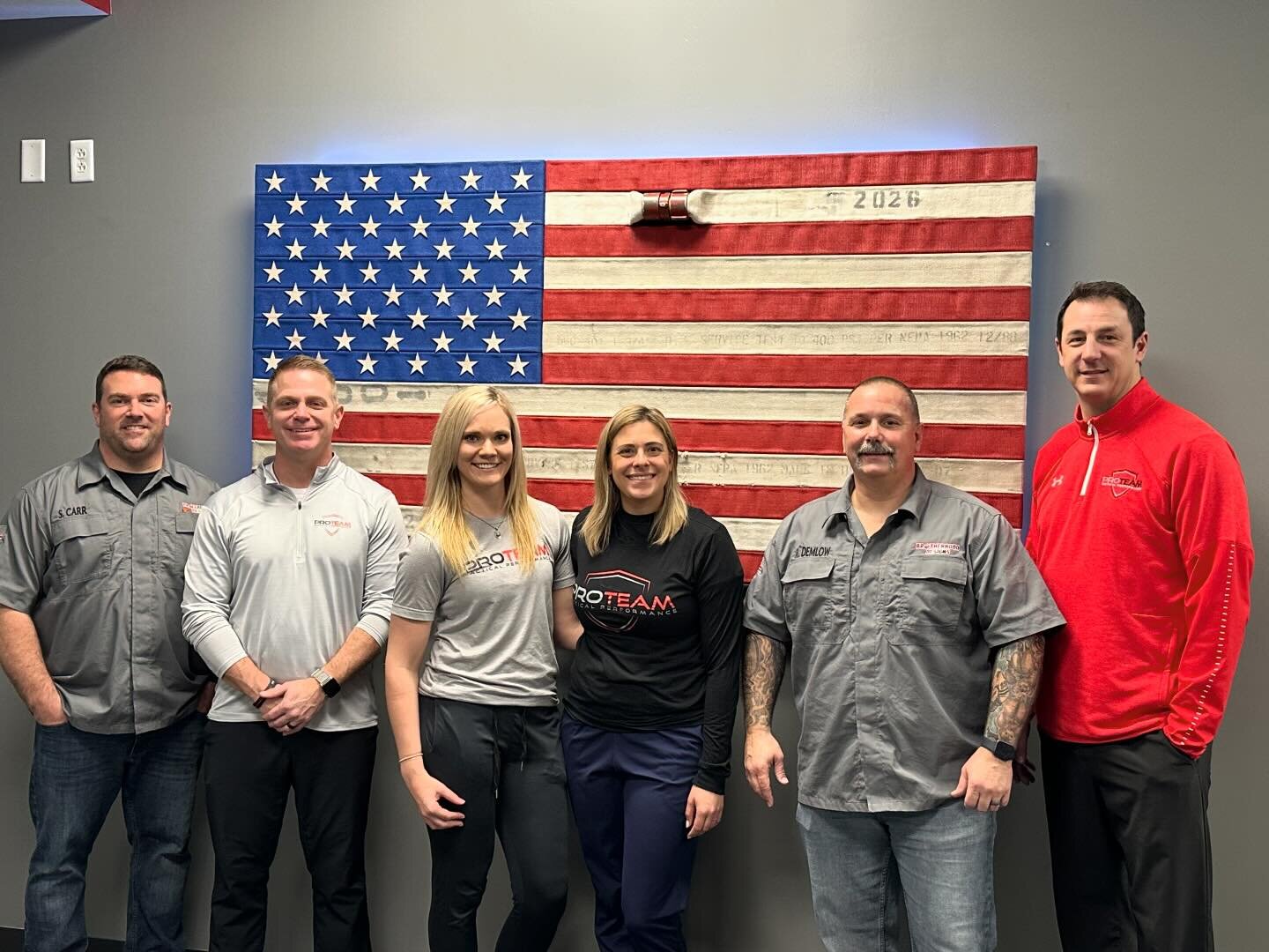 Yesterday, @brotherhooddesignsllc was happy to install flag #66 at the Westfield location for @proteamtactical.  Owner Jim Sorgi, Director of Business Development David Smith and clinicians Nicole and Kalie were happy to accept the flag and get a pic