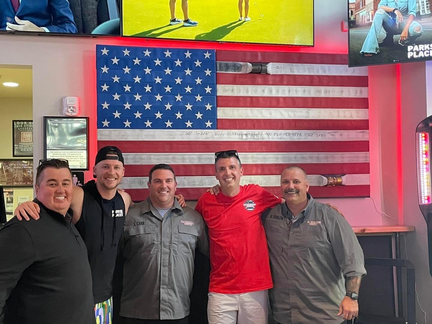Brotherhood Designs would like to give a big Anniversary shout-out to our friends at Parks Place Pub in Fishers!  On April 19th, 2023 Brotherhood unveiled flag #42 on the back wall of their awesome restaurant, backlit with an LED to really stand out!