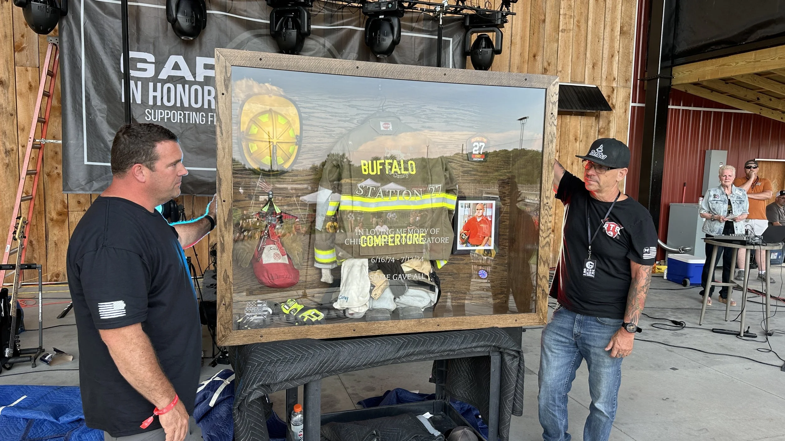 Custom fire gear display case from BDC - unveiled at the memorial on 7/12/25 - presented to Helen, Kaylee, Allyson Comperatore and Buffalo Twp Volunteer Fire Company