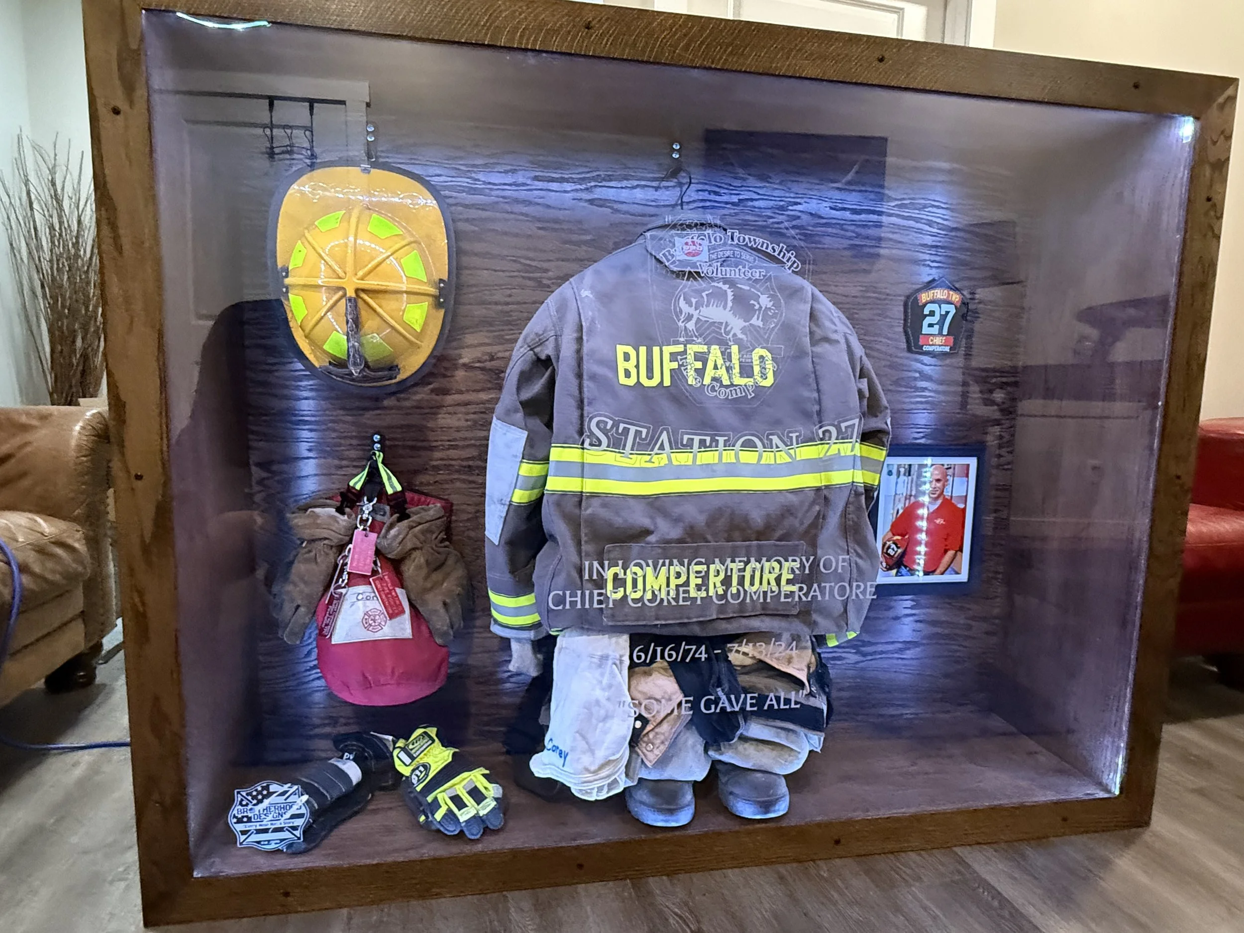 Custom fire gear display case from BDC - unveiled at the memorial on 7/12/25 - presented to Helen, Kaylee, Allyson Comperatore and Buffalo Twp Volunteer Fire Company