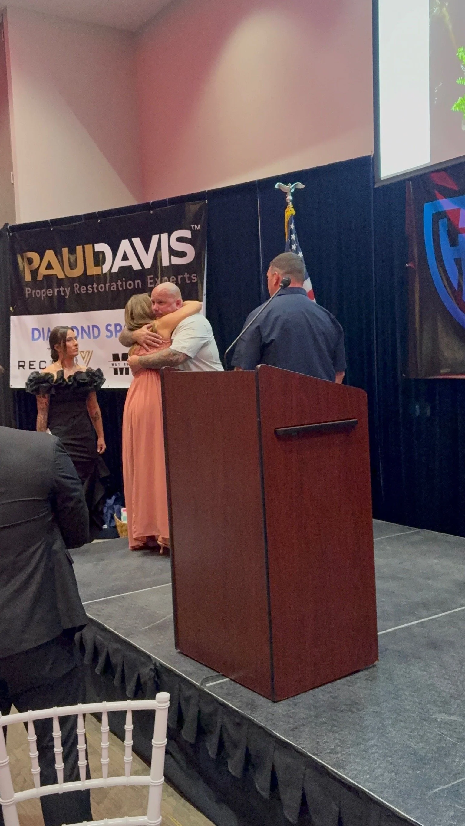 Helen Comperatore hugging Rob after introducing her
