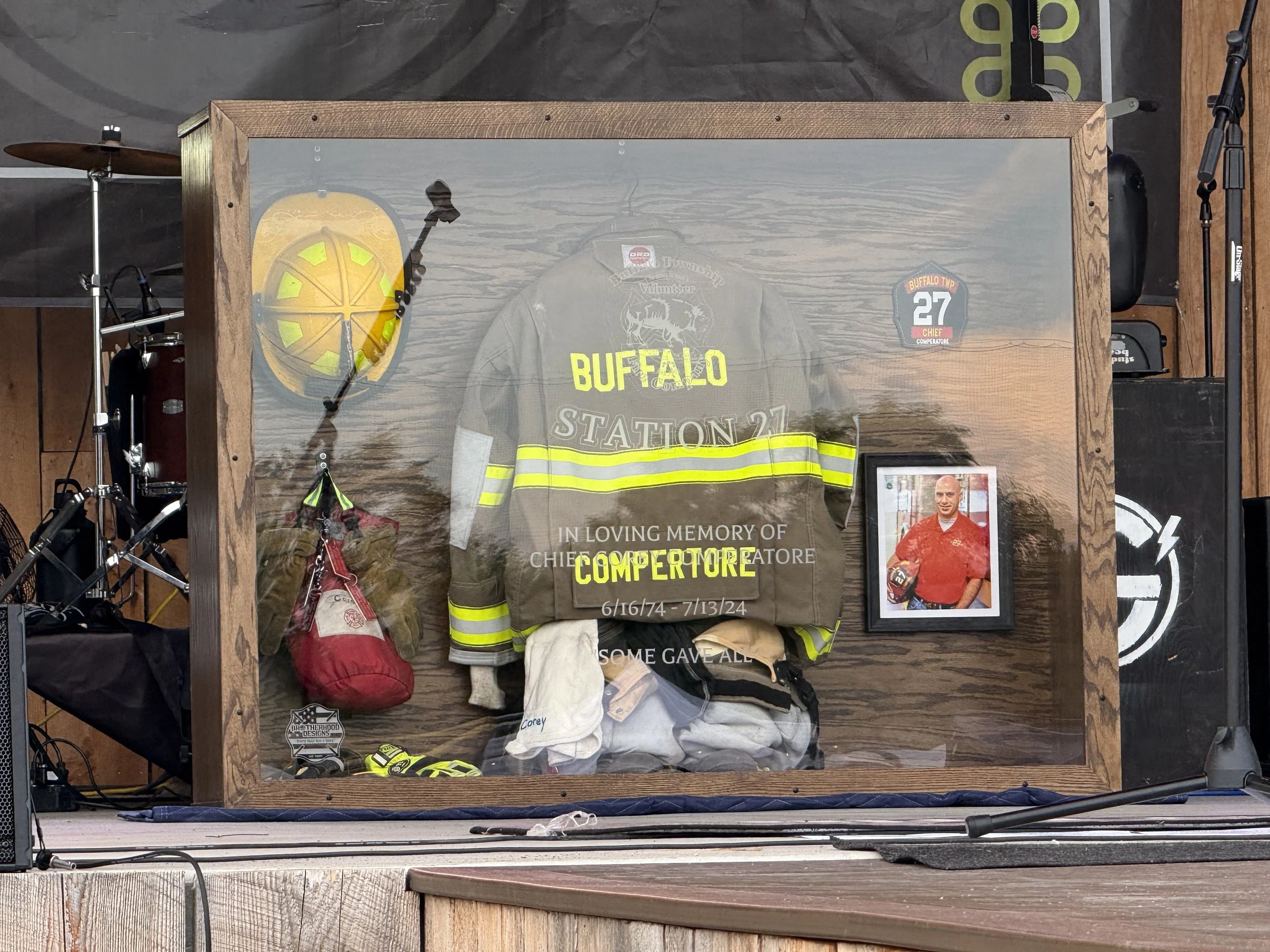 Custom fire gear display case from BDC - unveiled at the memorial on 7/12/25 - presented to Helen, Kaylee, Allyson Comperatore and Buffalo Twp Volunteer Fire Company