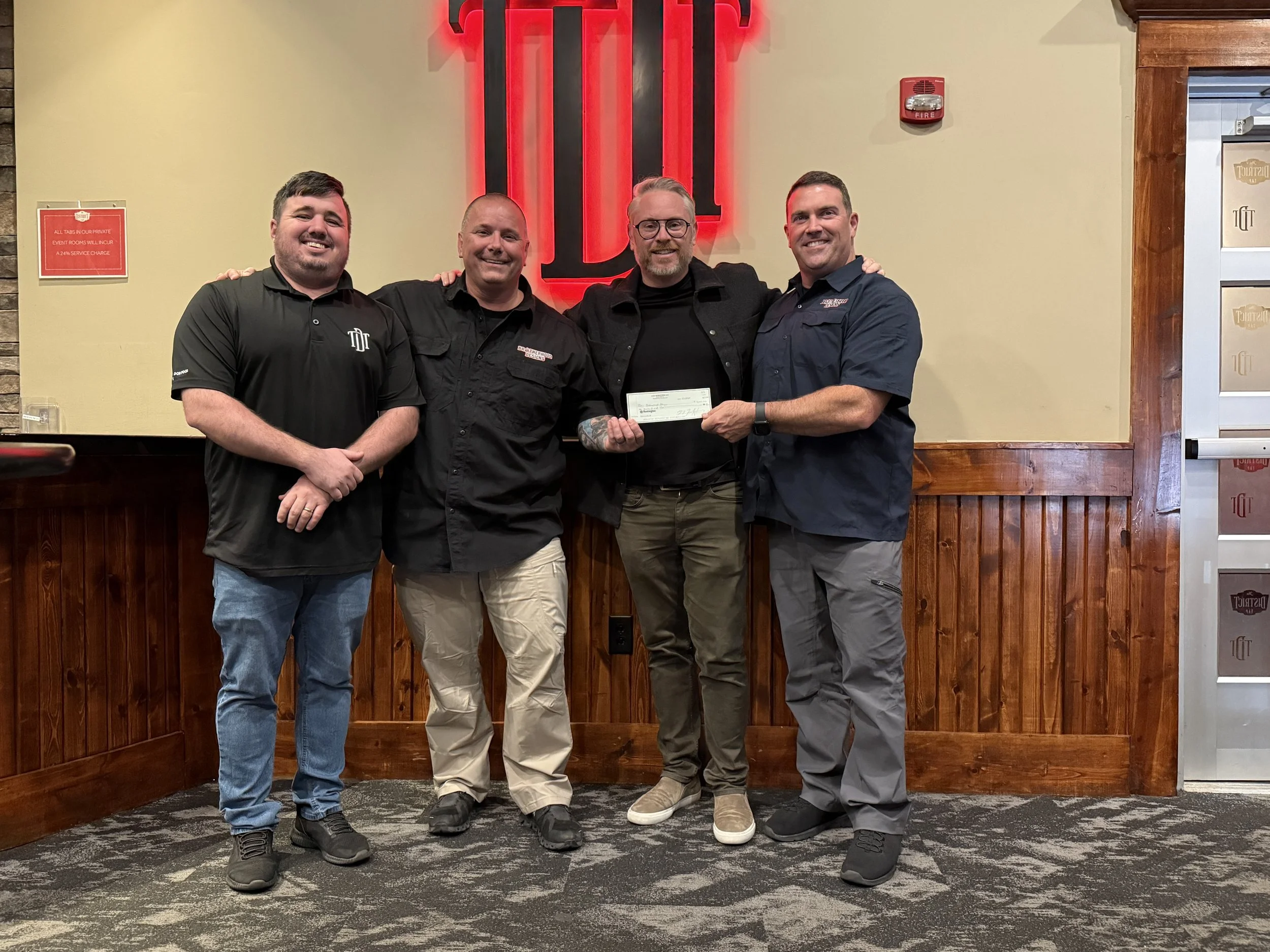 The District Tap - Northside - Title Sponsor - Flag #114 - Director of Operations Bryan, Rob, Owner Michael, Scott