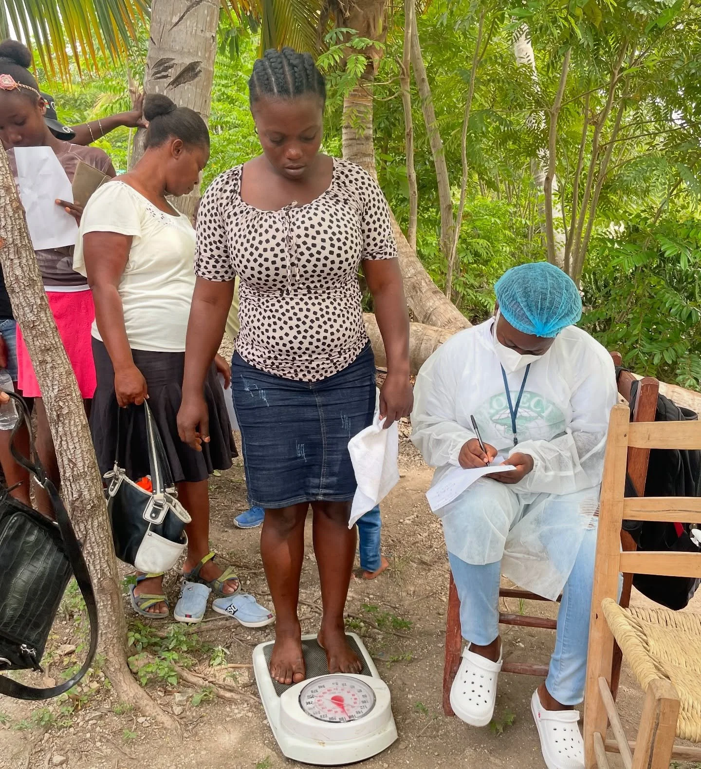 A Project Medishare staff member tracks a patients weight at a mobile clinic.

Checking weight during a doctor&rsquo;s checkup is important for: monitoring overall health, detecting potential health issues, and guiding treatment decisions. Weight can