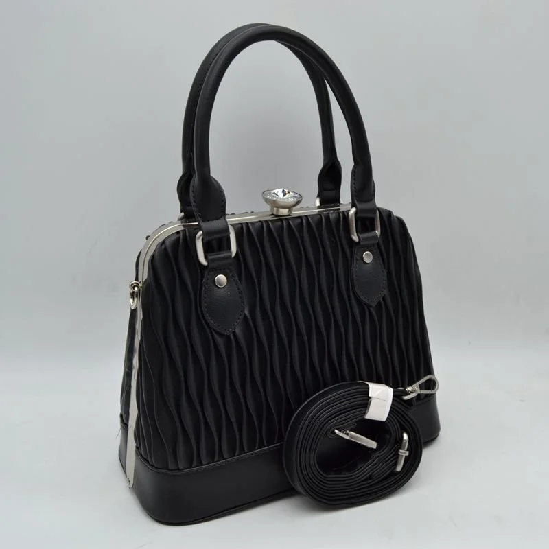 Large Black Textured Handbag 
W/ detachable strap
$30
