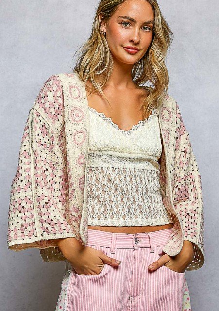 POL Brand
A three-quarter sleeve regular-fit cardigan top crafted in crochet, featuring a color-blocked granny square pattern. SIZE: OS
#909-617FS
$40  Colors: Pink and White