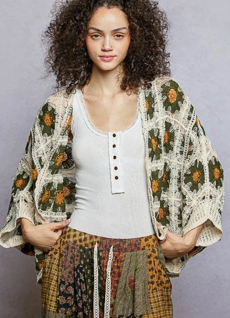 POL Brand
Designed in dolman sleeve roomy fit cardigan in crochet with floral pattern detail and border accents.  SIZE: OS #909-616FS
$38  Color: Olive Multi
