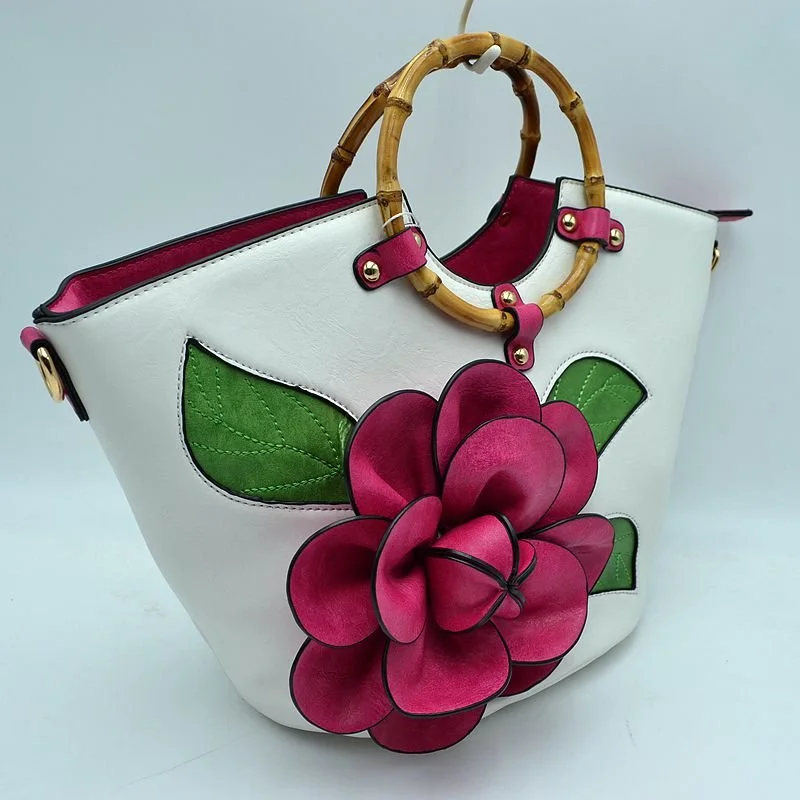 3D Large Floral Bag w/ Bamboo Handle plus a long adjustable matching strap
$48  White w/ Fuchsia Flower
