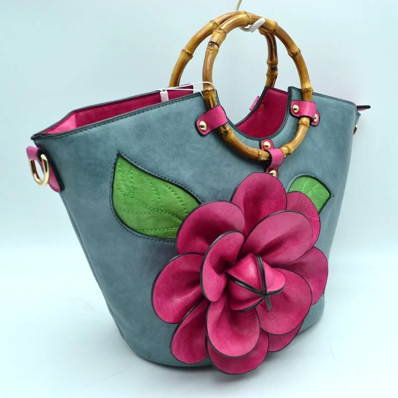 3D Large Floral Bag w/ Bamboo Handle plus a long adjustable matching strap
$48  Stone Blue w/Fuchsia Flower