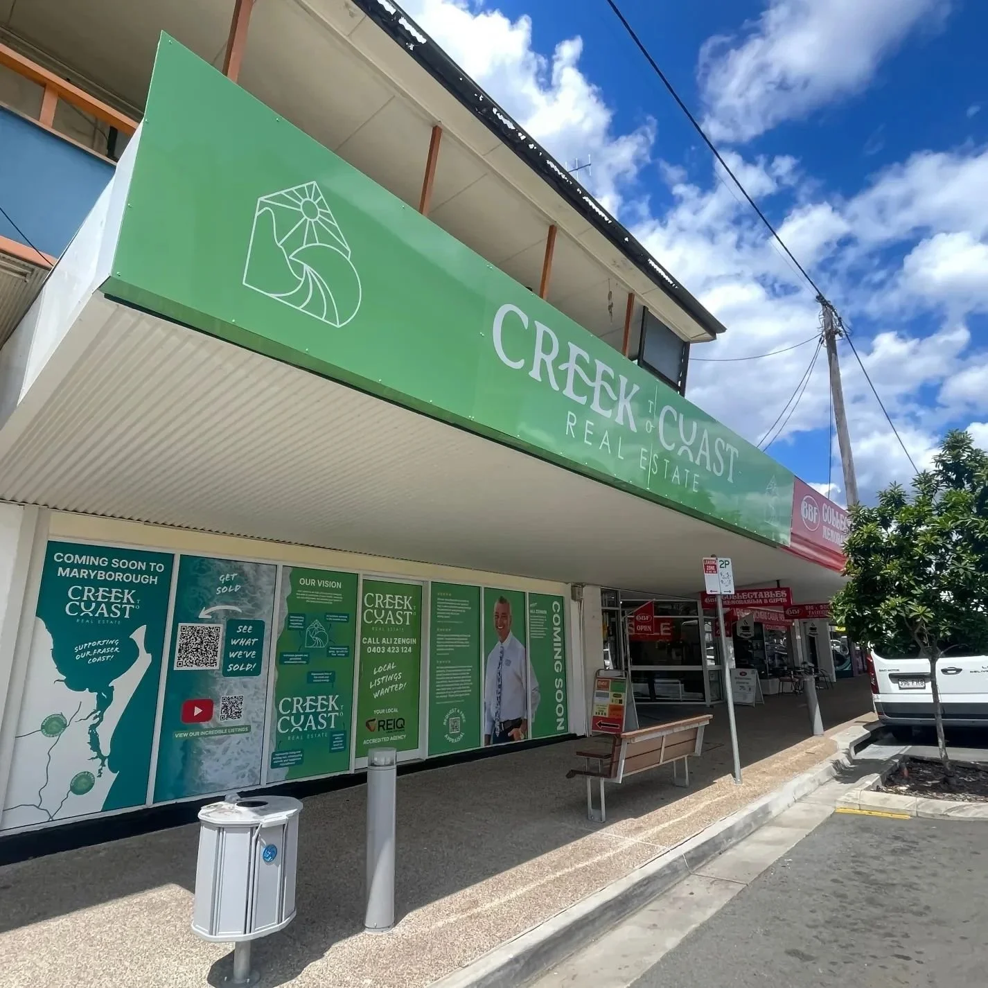 It looks incredibly vibrant and modern on Adelaide St in Maryborough this morning! @creektocoast.realestate has new signs designed by Marta at @solstruckstudio 🦋🌊🪴

Need a sign? Contact us today hi@solstruckstudio.com 

#logodesigner #signage #mar