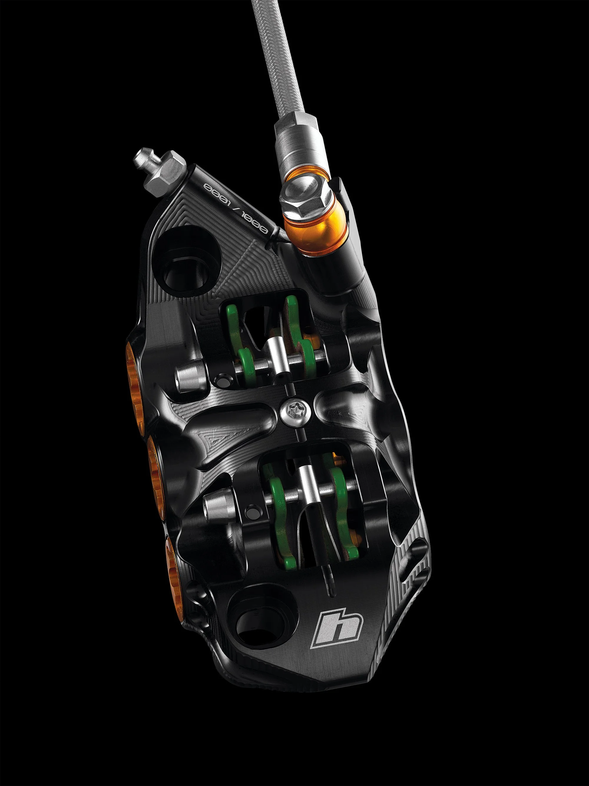 The caliper uses a radial mount system, eliminating post-mount constraints and creating space for larger pistons and pads. The V6Ti delivers greater power, consistency, and heat management, while a larger caliper body enhances stiffness and thermal e