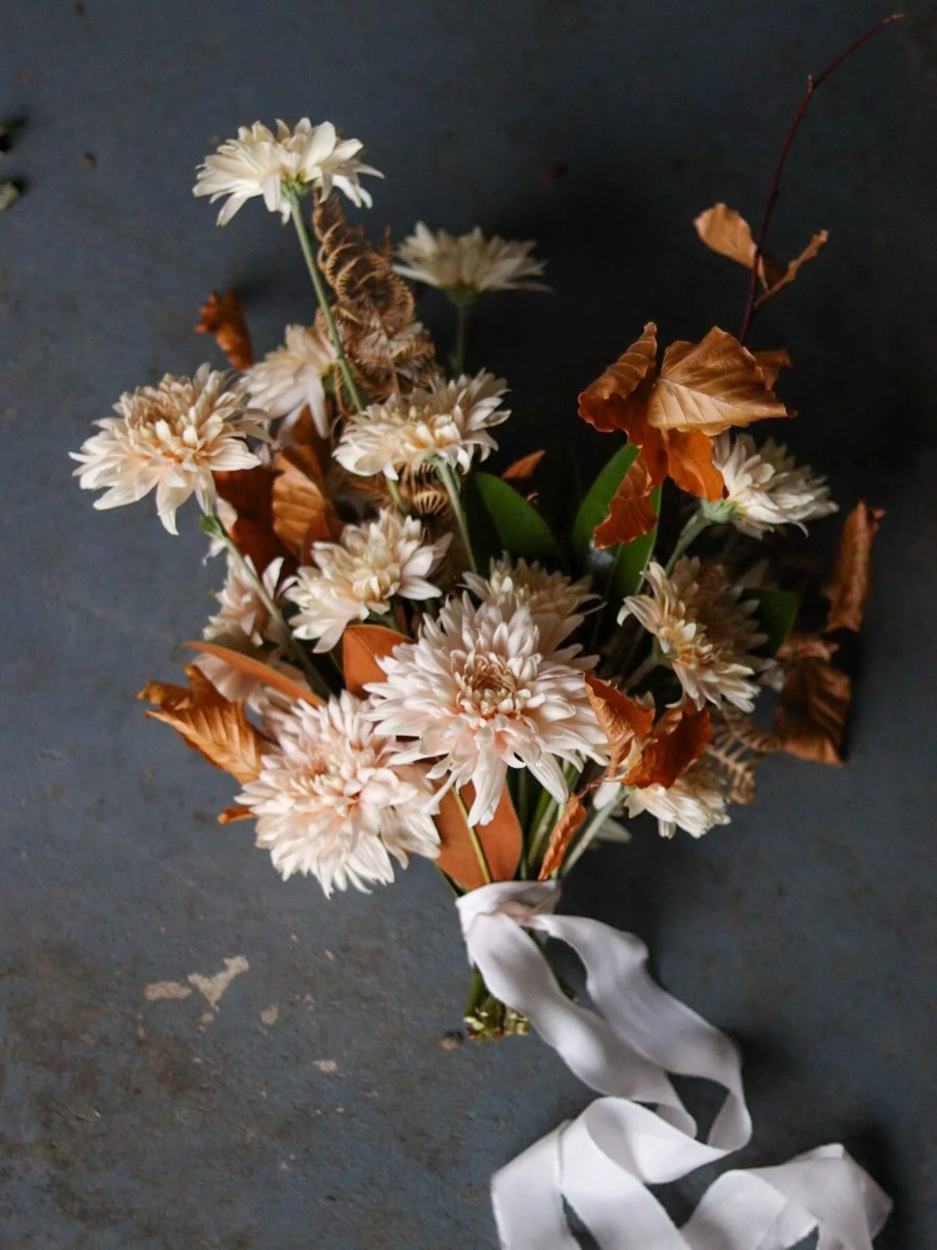 This time last year for beautiful Niki and Uwe. Chrysanthemums, magnolia, dried bracken and candlelight. 

At the risk of alienating my customer base 😳, I love a second wedding. They tend to be slightly more relaxed, more intimate, more willing to e