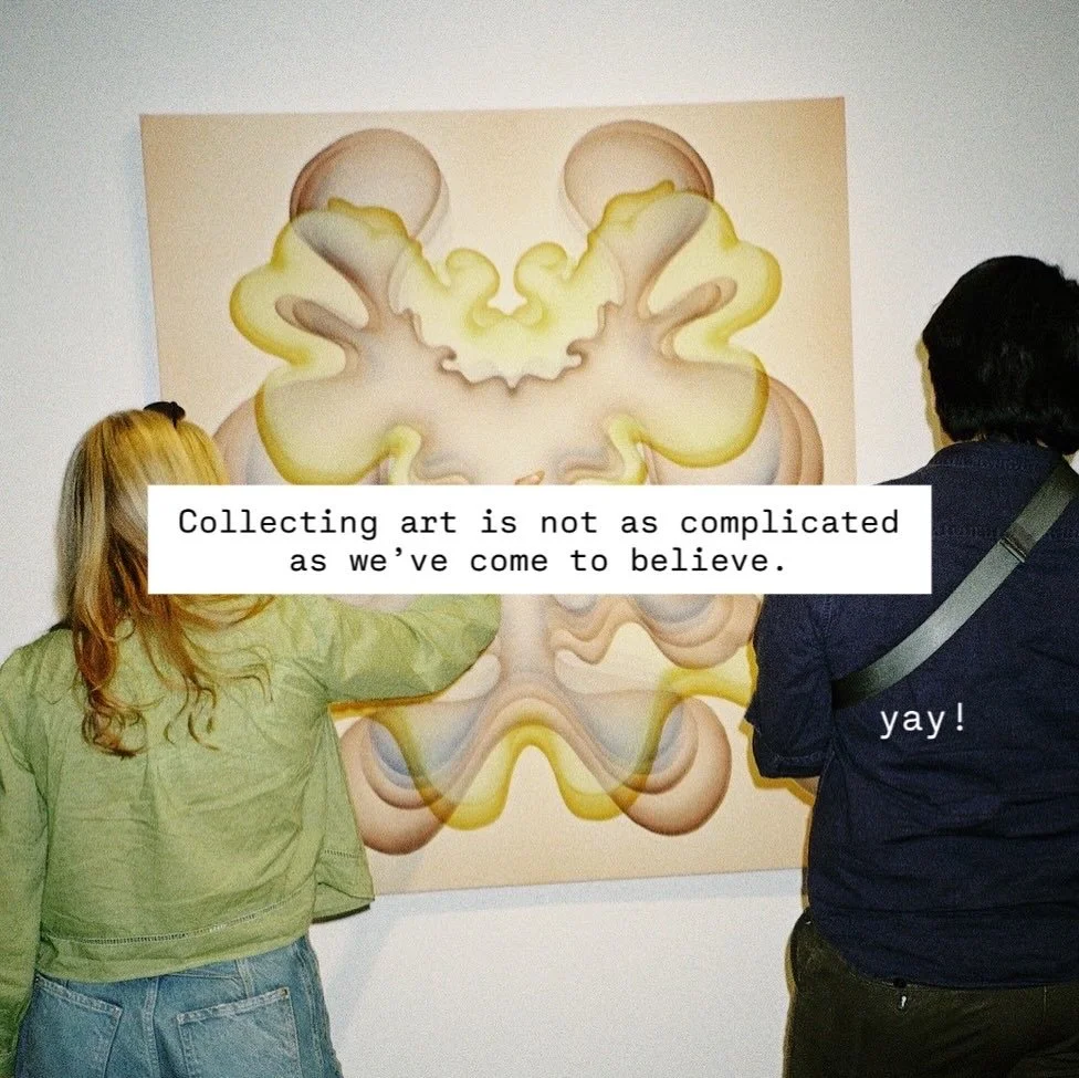 Two people, a woman with blonde hair and a man with dark hair, look at a colorful abstract artwork on the wall in an art gallery. The woman wears a light green jacket, and the man wears a dark jacket with a strap across his chest. There is a quote ov
