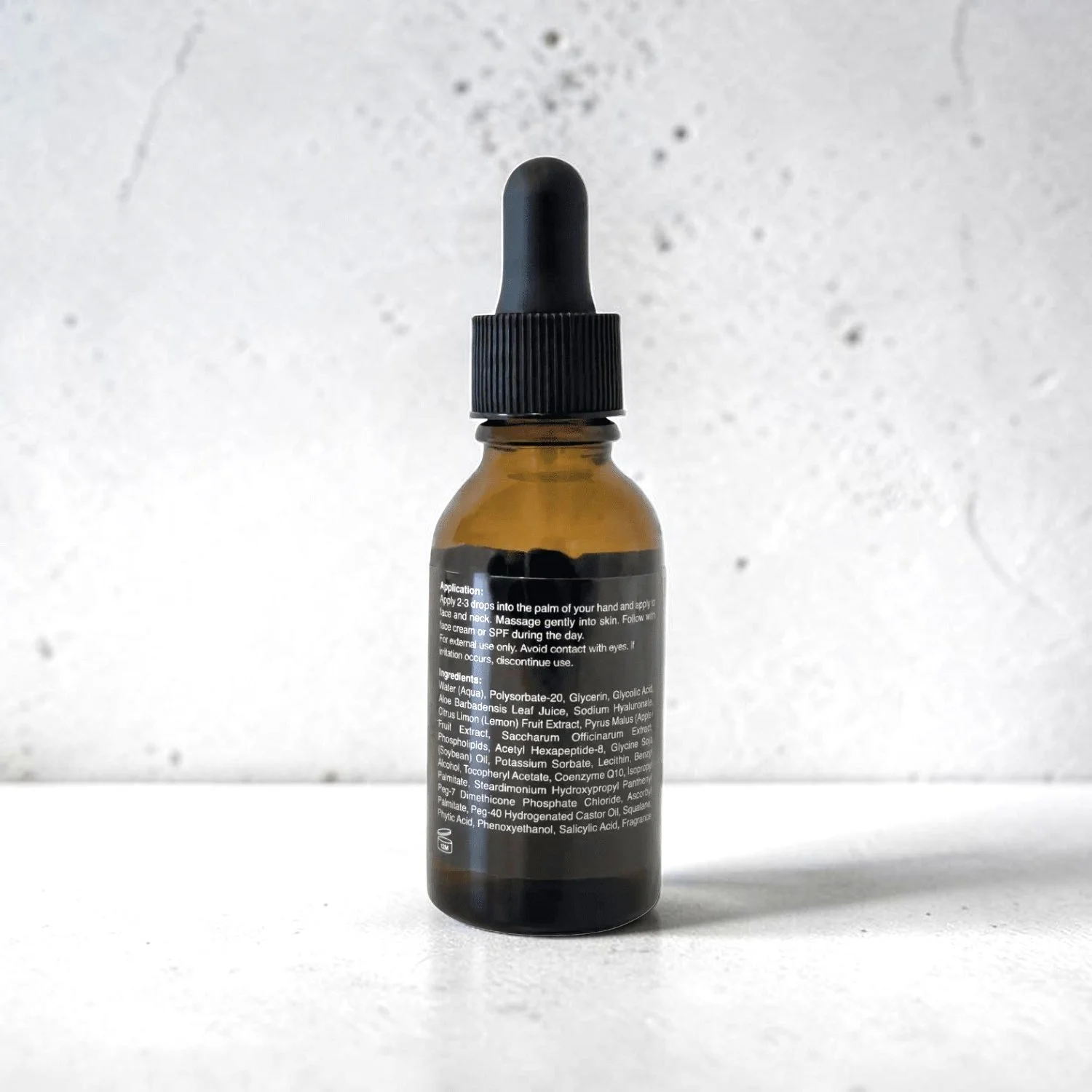Close-up of Venerate Glycolic Acid Serum skincare bottle