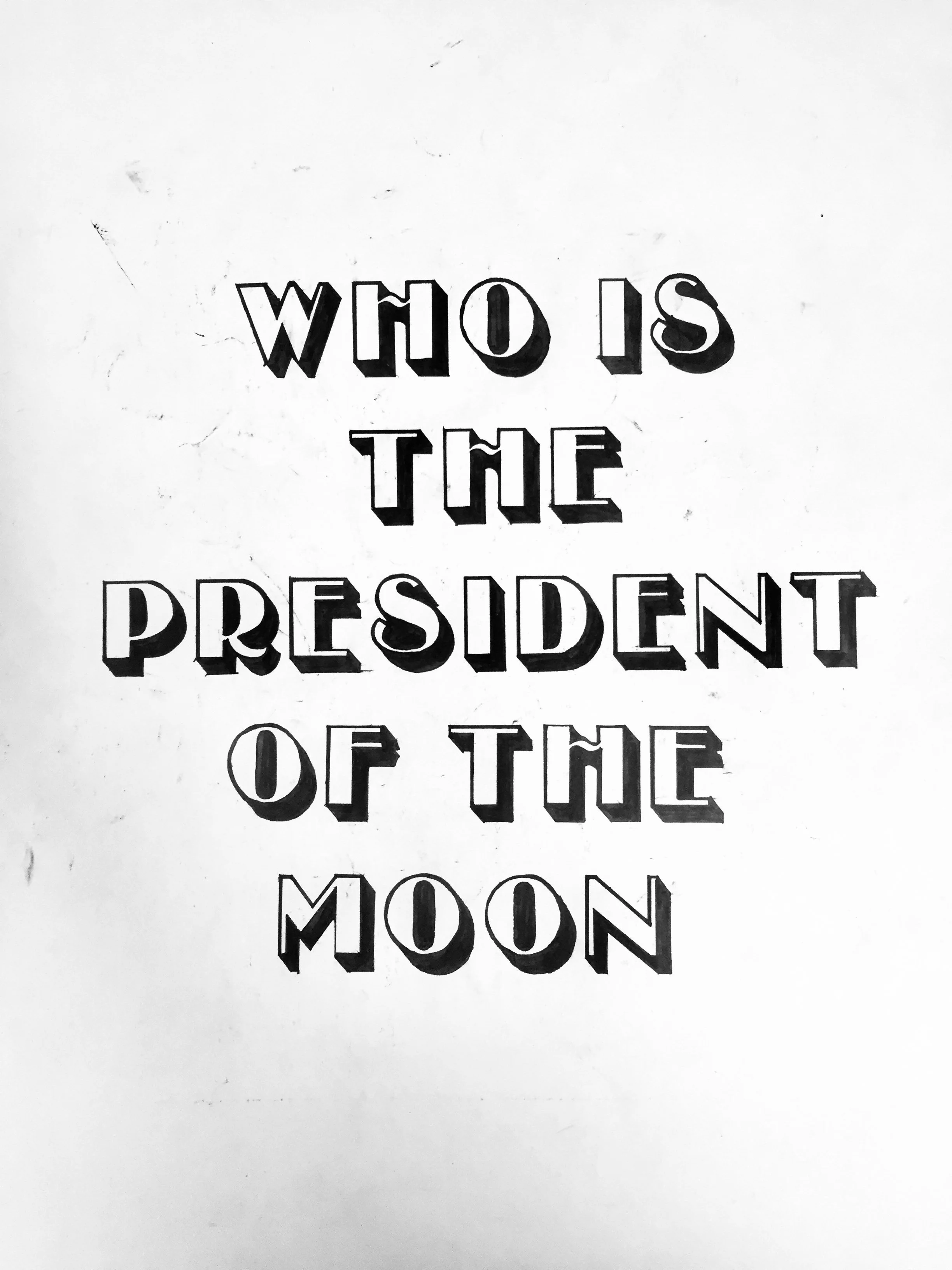 Black and white handwritten text that reads 'Who is the president of the moon'.