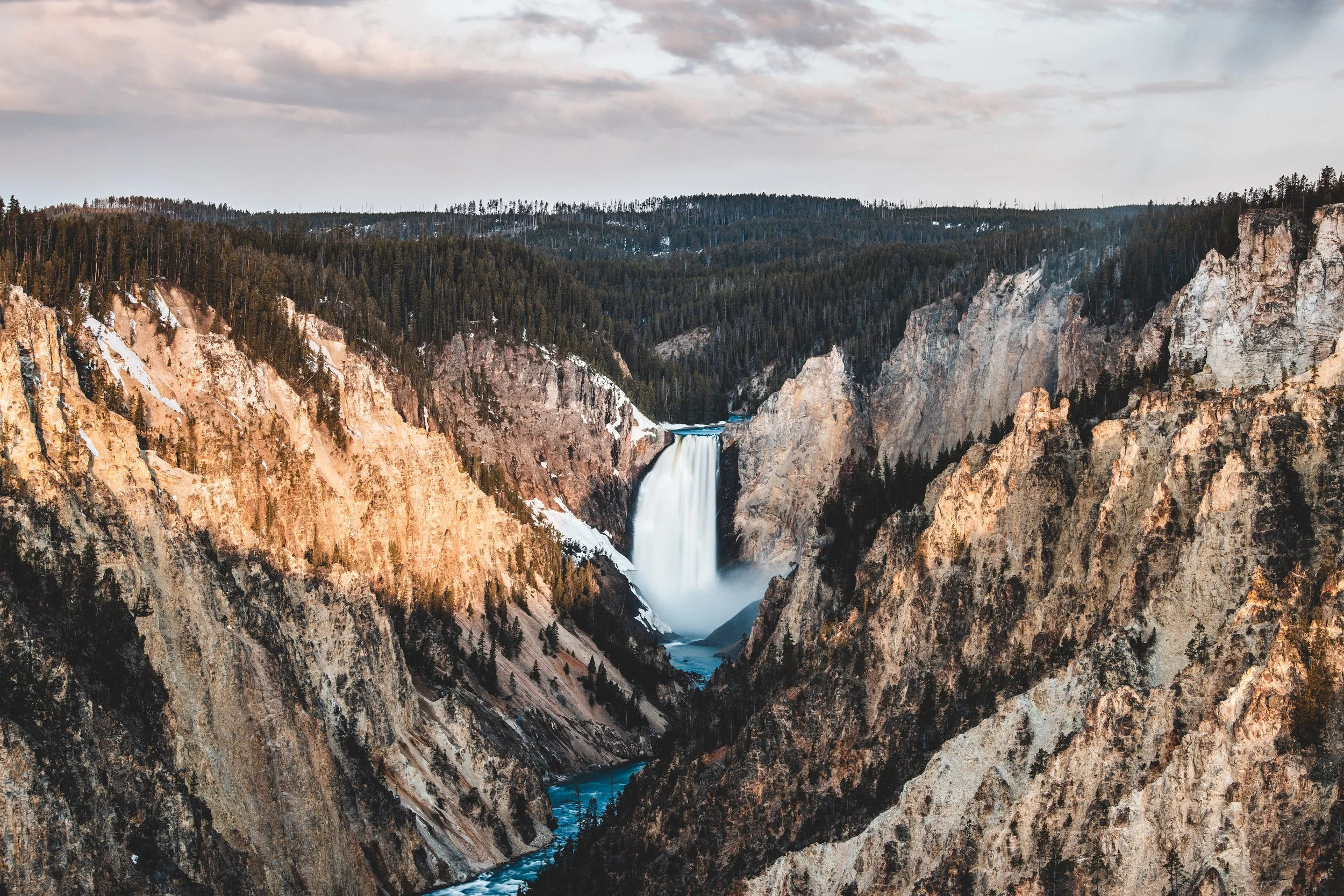 Waterfall in Yellowstone National Park canyon landscape