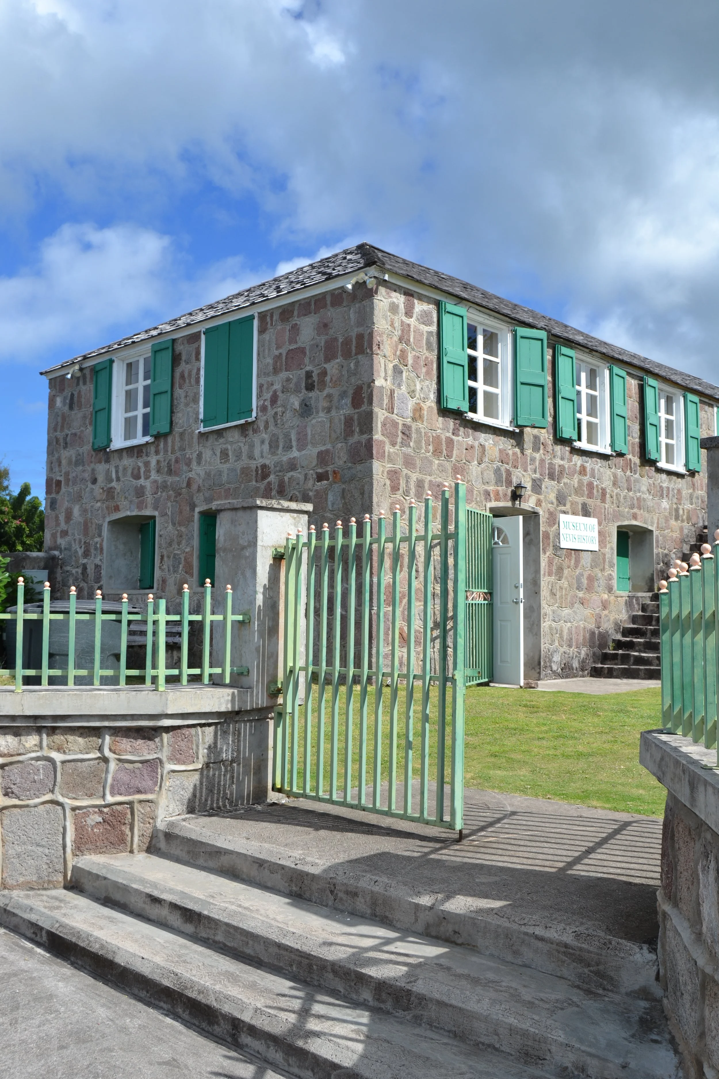 A view of Hamilton House, a two-story  building that was the birthplace of Alexander Hamilton. Hamilton lived on Nevis until the age of nine. The building now serves as the Museum of Nevis History. 