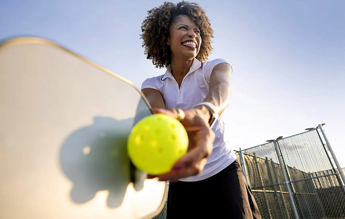 empty-nester-lady-playinig-pickleball.jpg