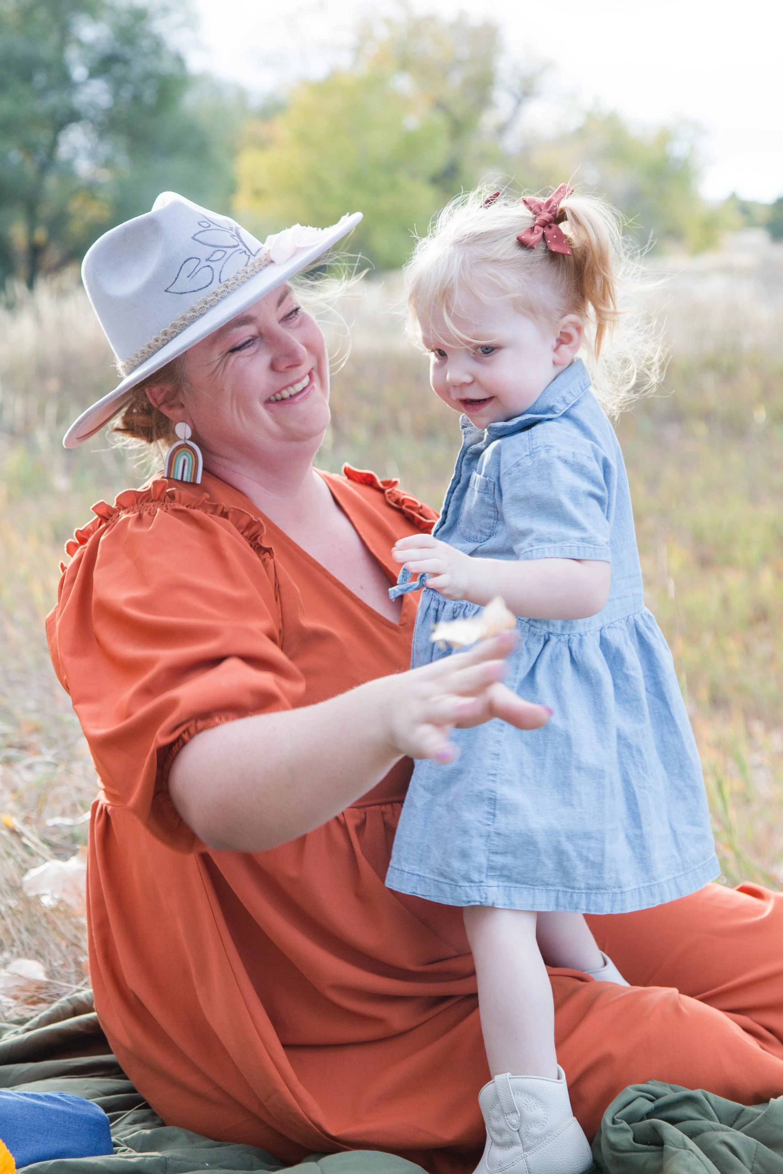 Mother and daughter laughing during Colorado fall mini session