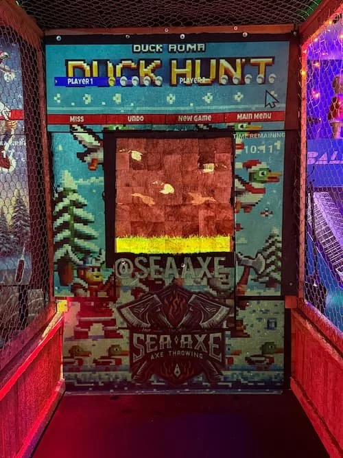 An axe throwing duck hunt game